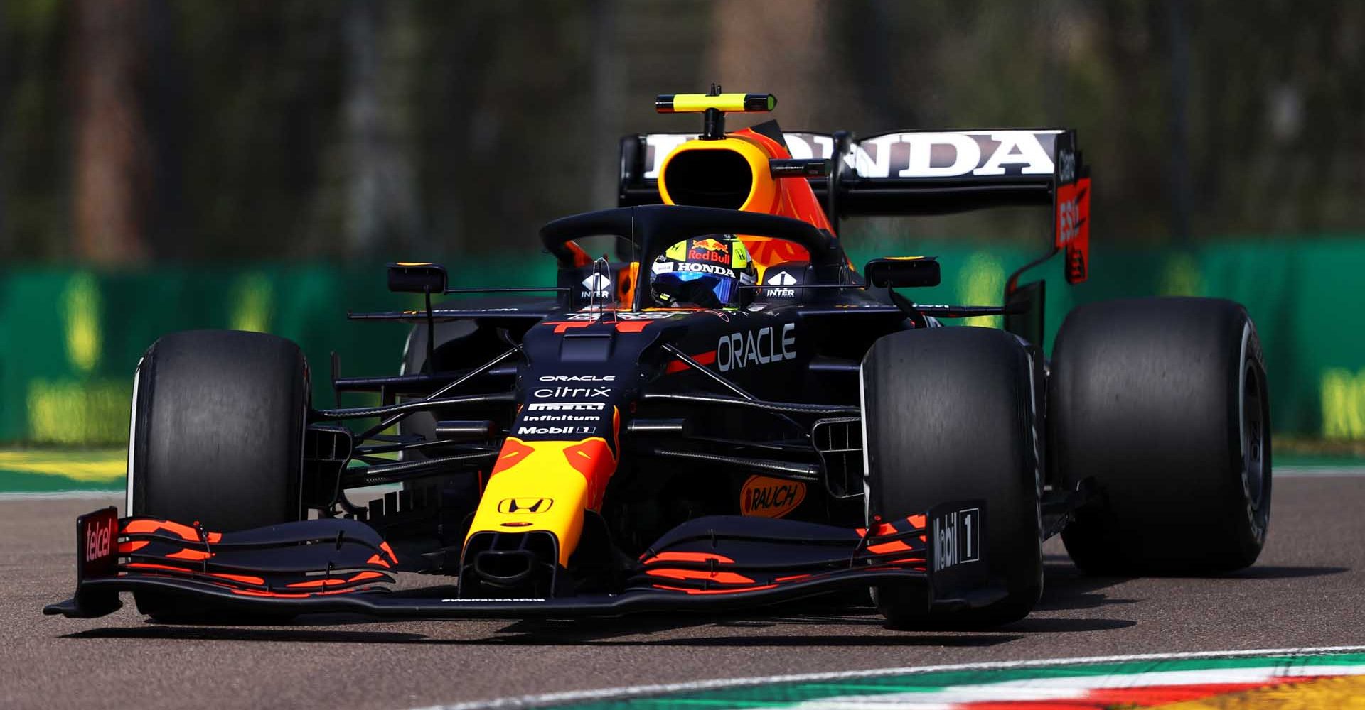 IMOLA, ITALY - APRIL 16: Sergio Perez of Mexico driving the (11) Red Bull Racing RB16B Honda on track during practice ahead of the F1 Grand Prix of Emilia Romagna at Autodromo Enzo e Dino Ferrari on April 16, 2021 in Imola, Italy. (Photo by Bryn Lennon/Getty Images)