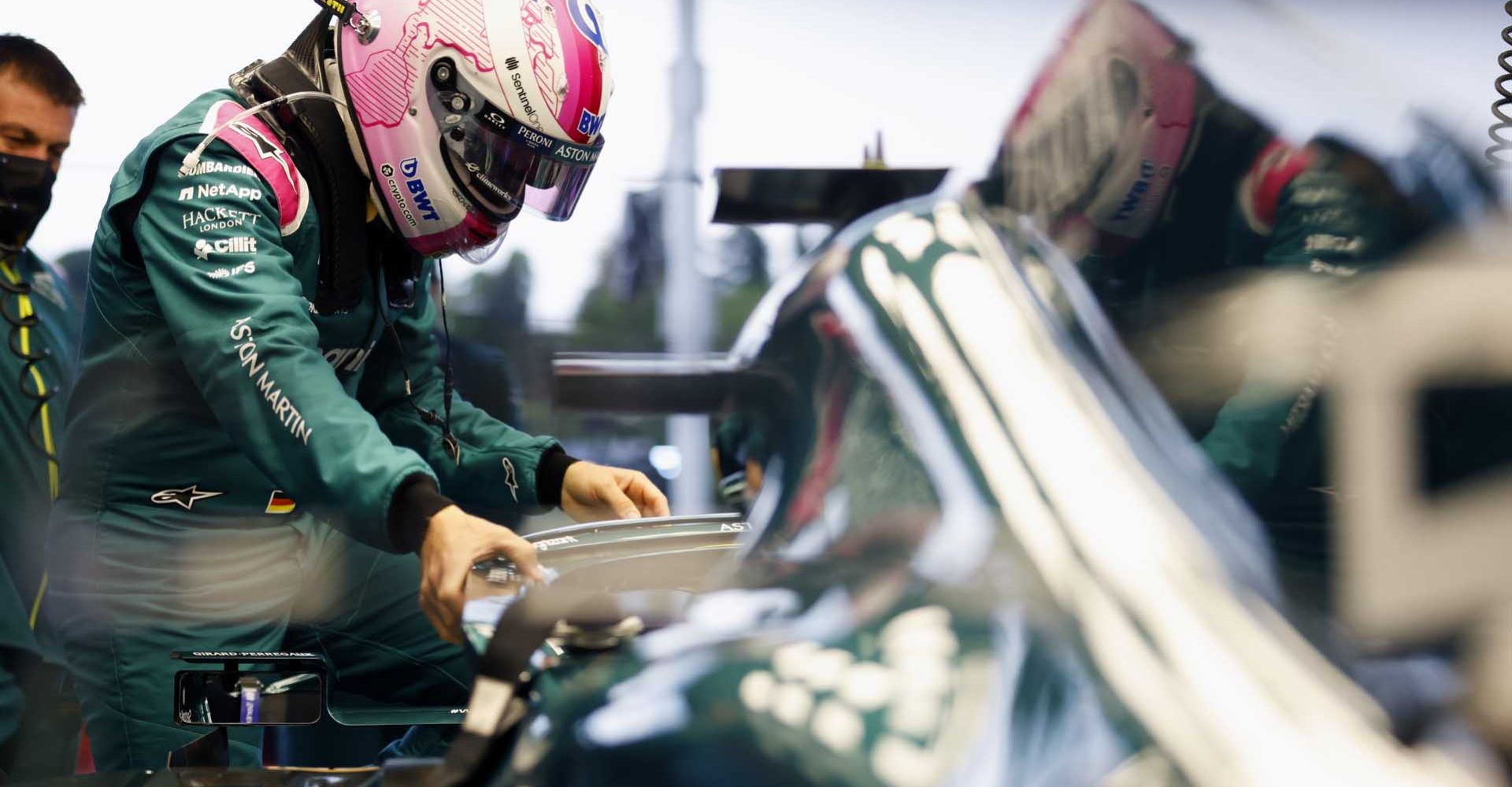 Sebastian Vettel, Aston Martin AMR21, gets into his car