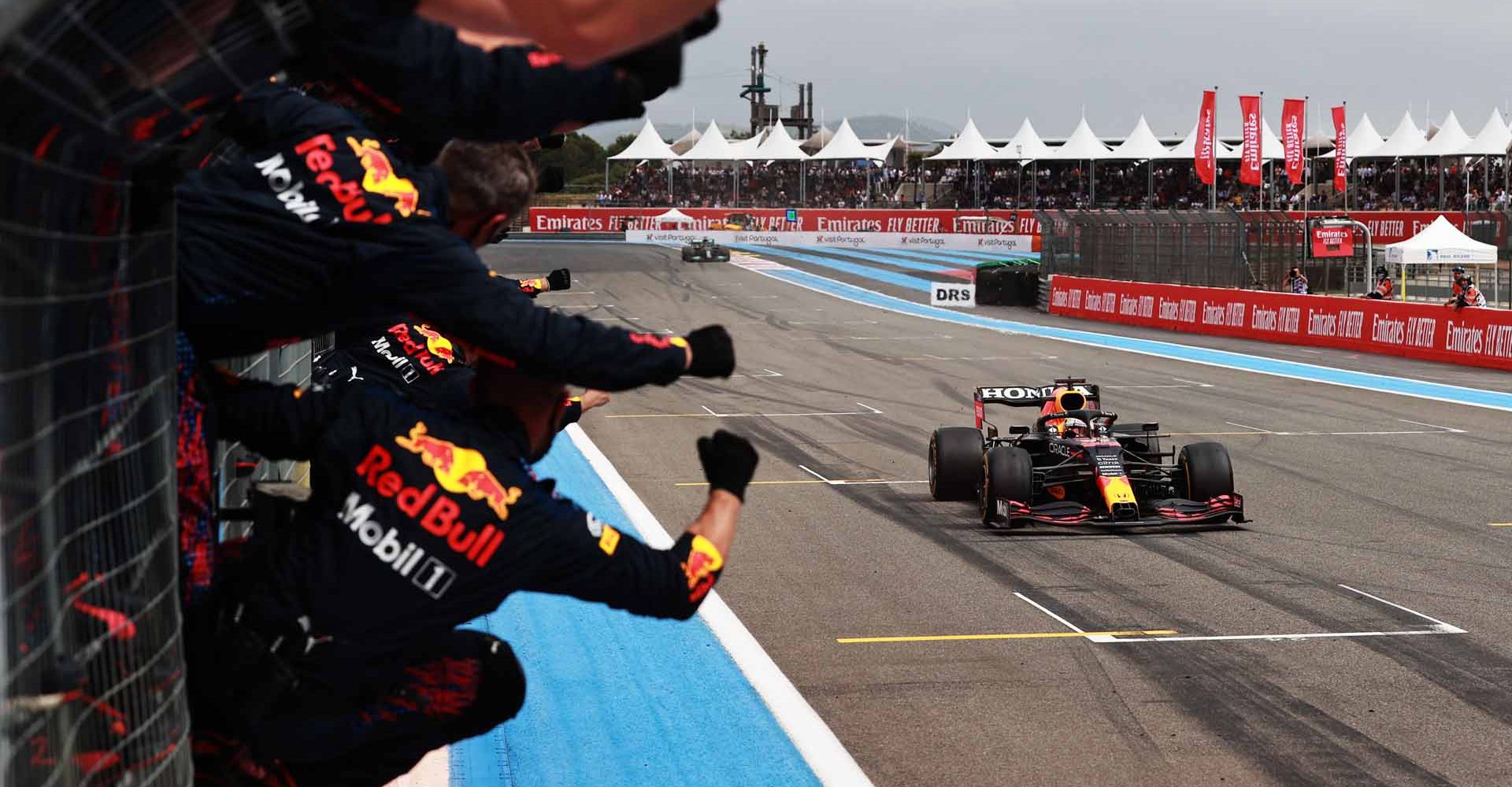 LE CASTELLET, FRANCE - JUNE 20: Red Bull Racing team members celebrate on the pitwall as Max Verstappen of the Netherlands driving the (33) Red Bull Racing RB16B Honda crosses the finish line to win during the F1 Grand Prix of France at Circuit Paul Ricard on June 20, 2021 in Le Castellet, France. (Photo by Mark Thompson/Getty Images)