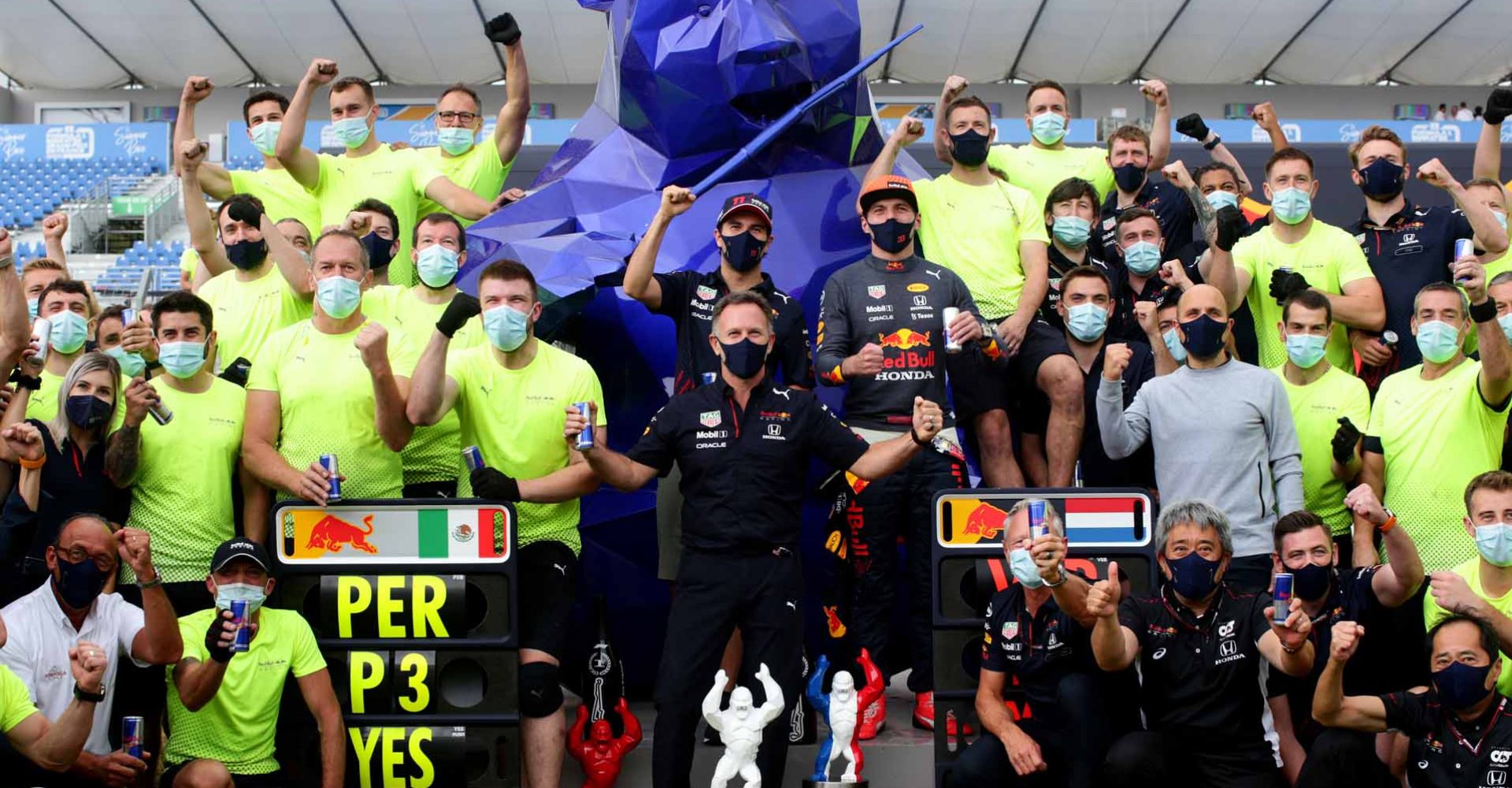 LE CASTELLET, FRANCE - JUNE 20:  Race winner Max Verstappen of Netherlands and Red Bull Racing and third placed Sergio Perez of Mexico and Red Bull Racing celebrate with Red Bull Racing Team Principal Christian Horner and their team in the Paddock after the F1 Grand Prix of France at Circuit Paul Ricard on June 20, 2021 in Le Castellet, France. (Photo by Peter Fox/Getty Images)