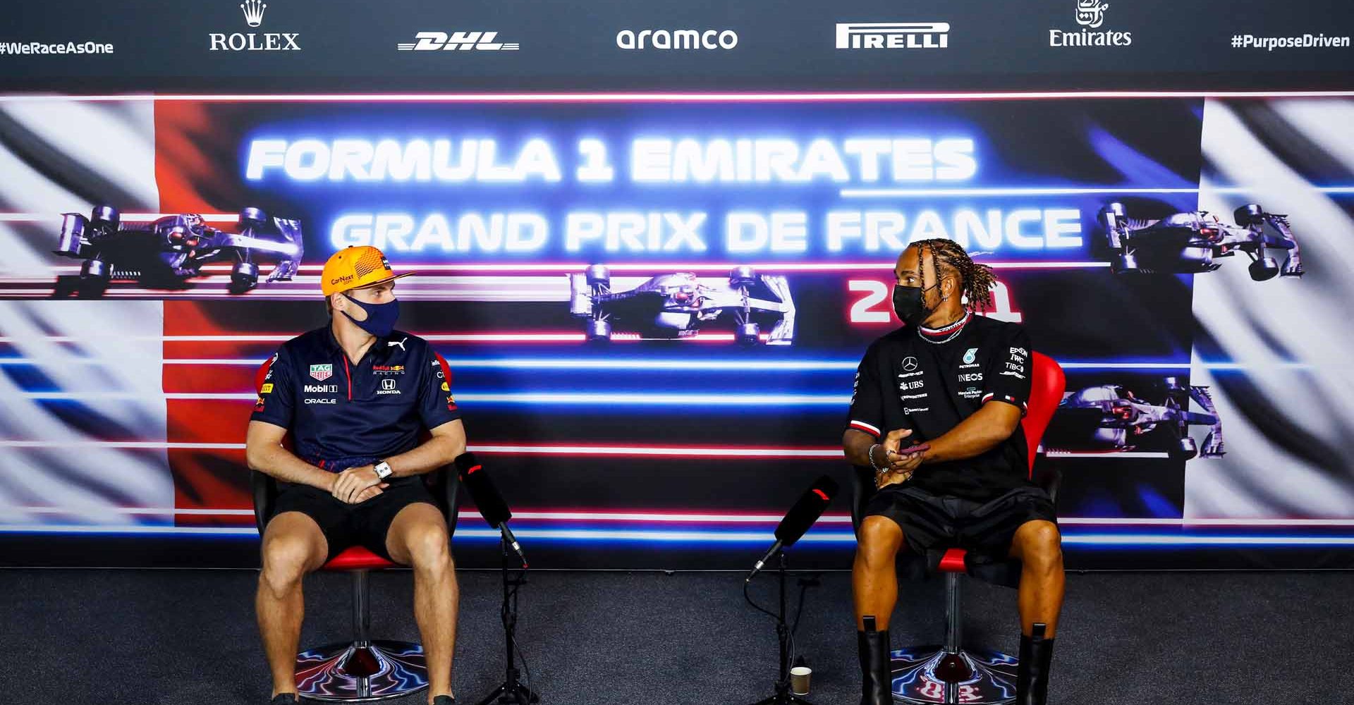 LE CASTELLET, FRANCE - JUNE 17: Max Verstappen of Netherlands and Red Bull Racing and Lewis Hamilton of Great Britain and Mercedes GP talk in the Drivers Press Conference during previews ahead of the F1 Grand Prix of France at Circuit Paul Ricard on June 17, 2021 in Le Castellet, France. (Photo by Antonin Vincent - Pool/Getty Images)