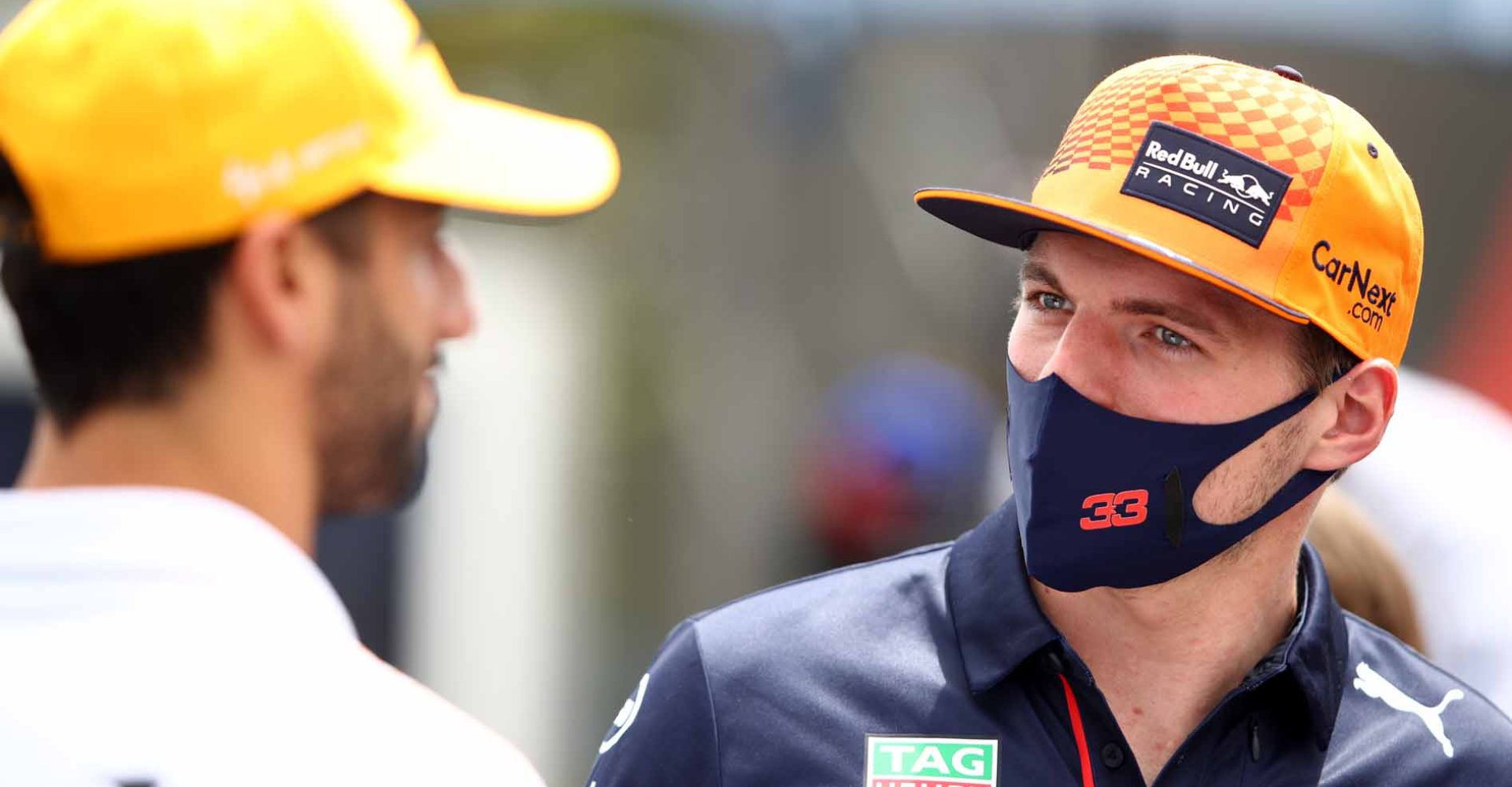 LE CASTELLET, FRANCE - JUNE 17: Max Verstappen of Netherlands and Red Bull Racing talks with Daniel Ricciardo of Australia and McLaren F1 in the Paddock during previews ahead of the F1 Grand Prix of France at Circuit Paul Ricard on June 17, 2021 in Le Castellet, France. (Photo by Mark Thompson/Getty Images)