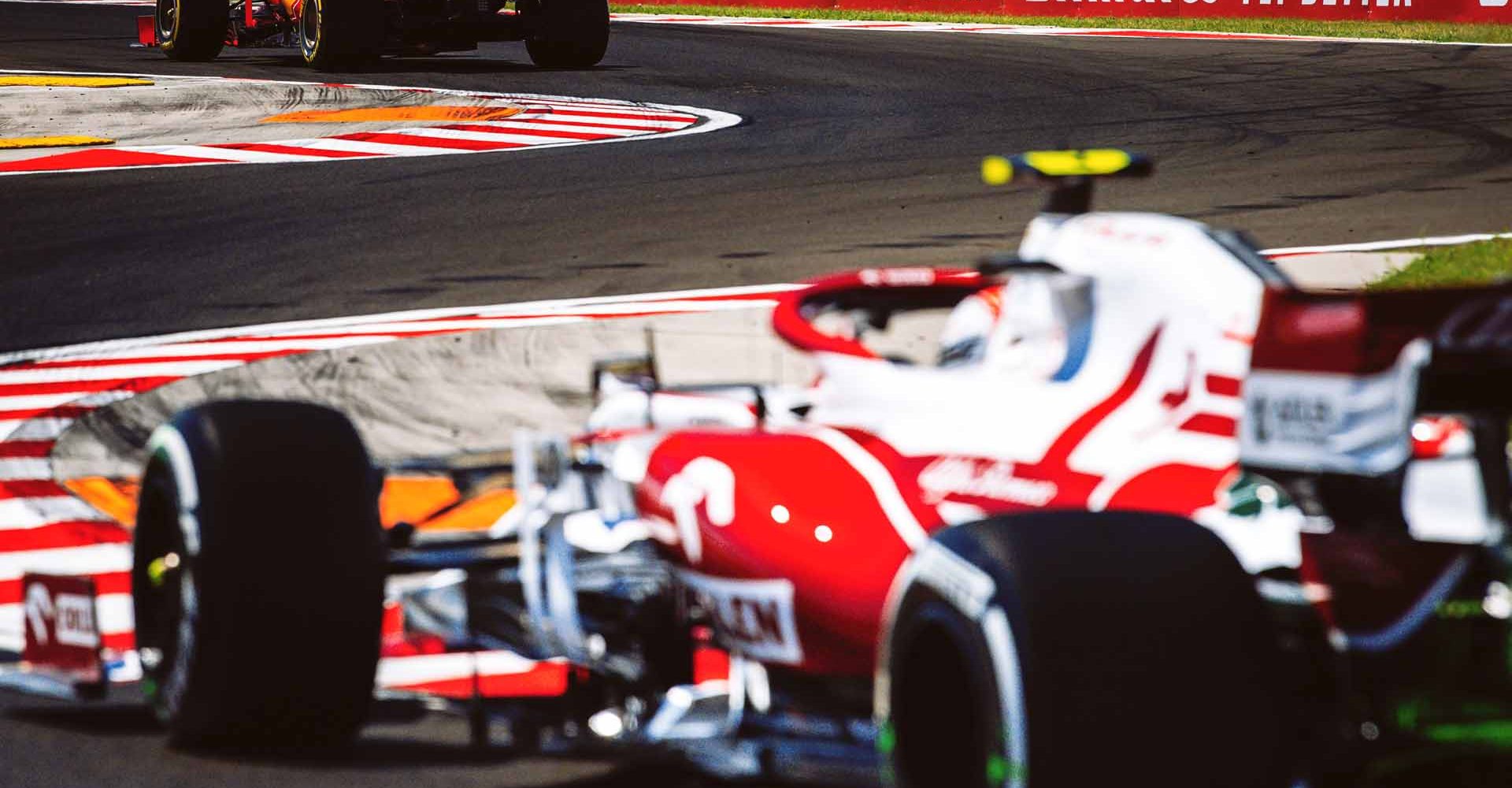 Carlos Sainz (Ferrari), followed by Antonio Giovinazzi (Alfa Romeo)