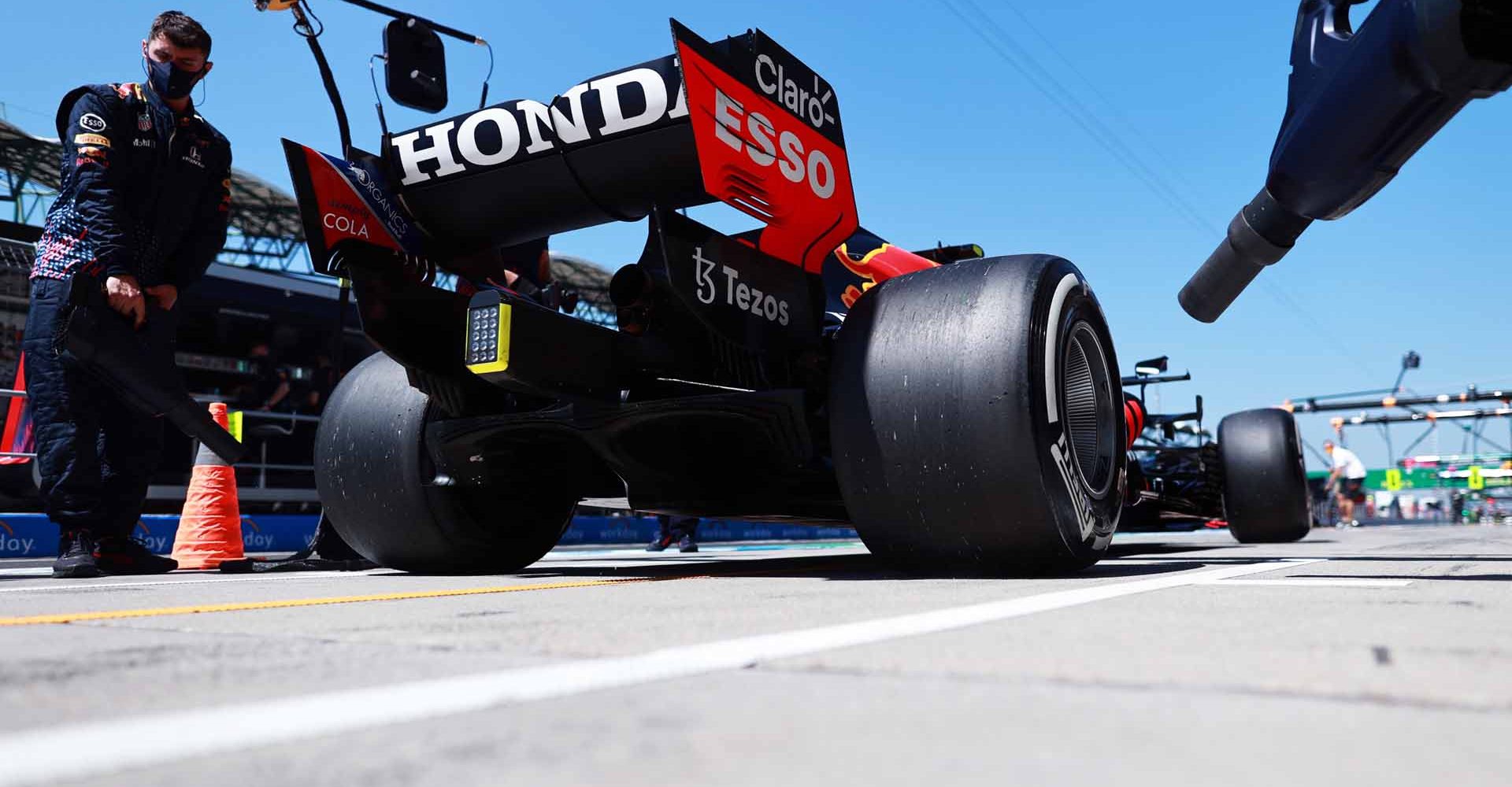 BUDAPEST, HUNGARY - JULY 30: Sergio Perez of Mexico driving the (11) Red Bull Racing RB16B Honda stops in the Pitlane during practice ahead of the F1 Grand Prix of Hungary at Hungaroring on July 30, 2021 in Budapest, Hungary. (Photo by Mark Thompson/Getty Images)