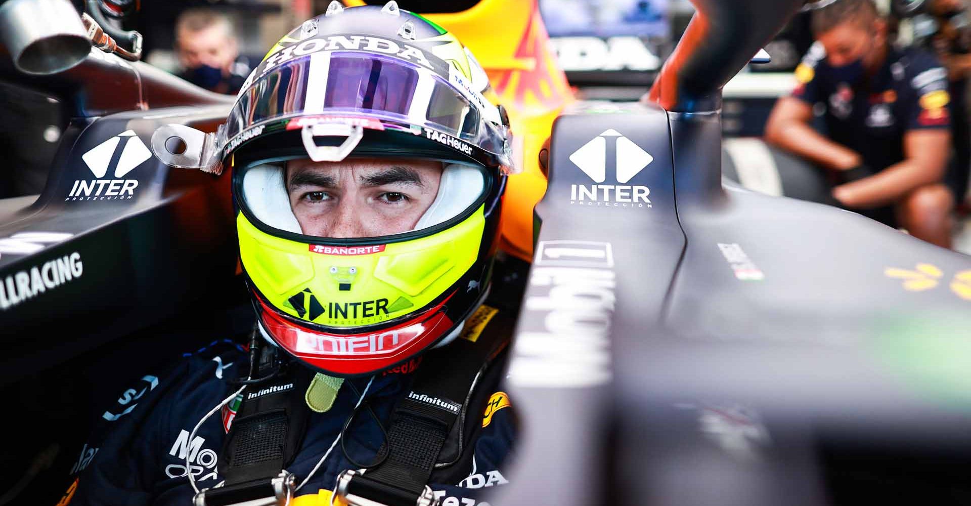 BUDAPEST, HUNGARY - JULY 30: Sergio Perez of Mexico and Red Bull Racing prepares to drive in the garage during practice ahead of the F1 Grand Prix of Hungary at Hungaroring on July 30, 2021 in Budapest, Hungary. (Photo by Mark Thompson/Getty Images)