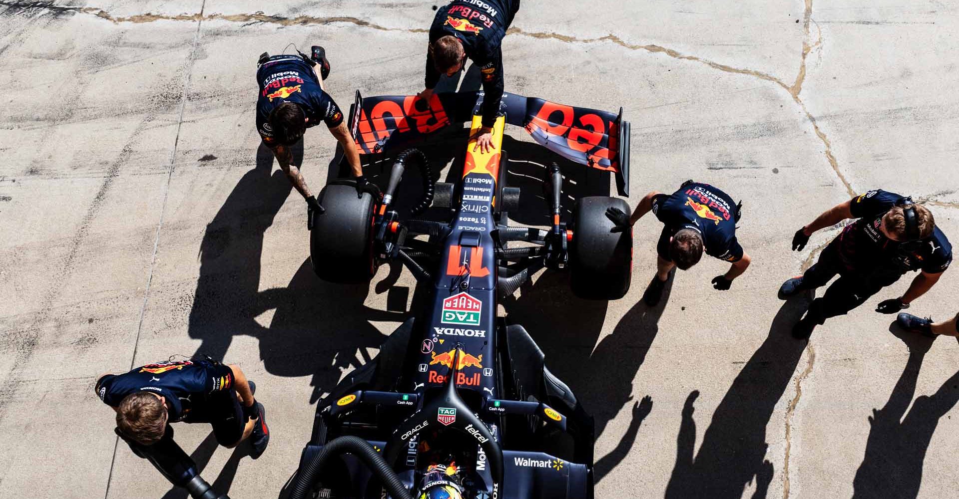 BUDAPEST, HUNGARY - JULY 31: Sergio Perez of Mexico driving the (11) Red Bull Racing RB16B Honda stops in the Pitlane during qualifying ahead of the F1 Grand Prix of Hungary at Hungaroring on July 31, 2021 in Budapest, Hungary. (Photo by Getty Images/Getty Images)