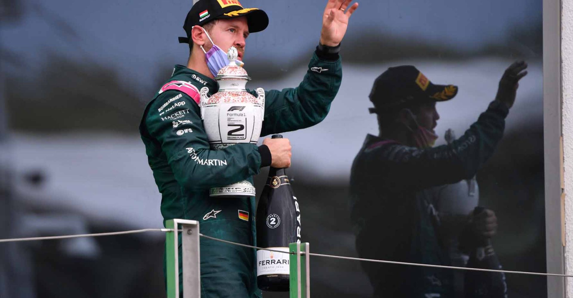 Sebastian Vettel, Aston Martin, 2nd position, with his trophy and Champagne