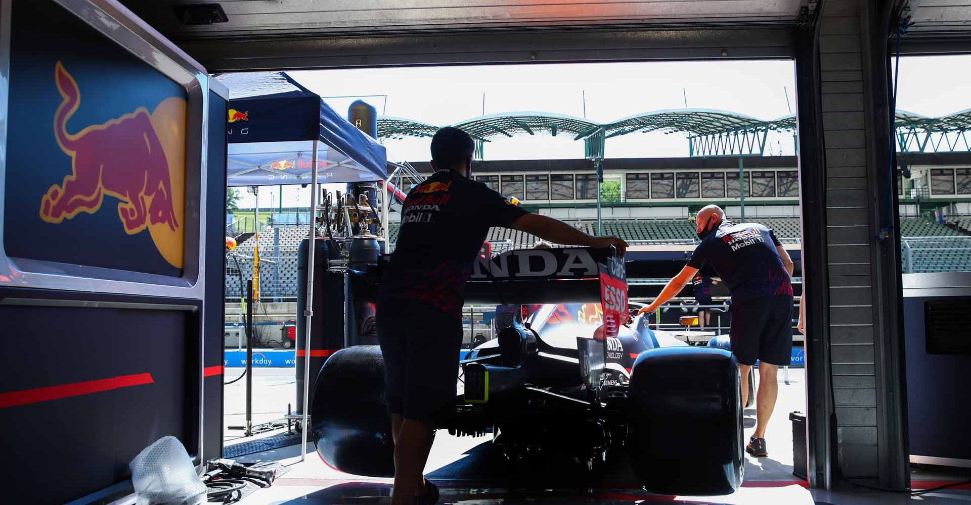 BUDAPEST, HUNGARY - JULY 29: The Red Bull Racing team work in the garage during previews ahead of the F1 Grand Prix of Hungary at Hungaroring on July 29, 2021 in Budapest, Hungary. (Photo by Mark Thompson/Getty Images)