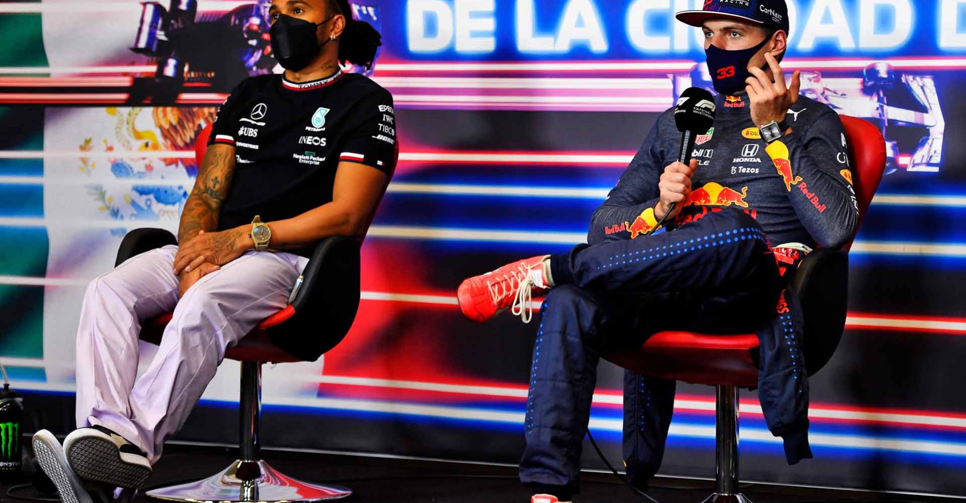 MEXICO CITY, MEXICO - NOVEMBER 07: Race winner Max Verstappen of Netherlands and Red Bull Racing and second placed Lewis Hamilton of Great Britain and Mercedes GP talk in a press conference after the F1 Grand Prix of Mexico at Autodromo Hermanos Rodriguez on November 07, 2021 in Mexico City, Mexico. (Photo by Rudy Carezzevoli - Pool/Getty Images)