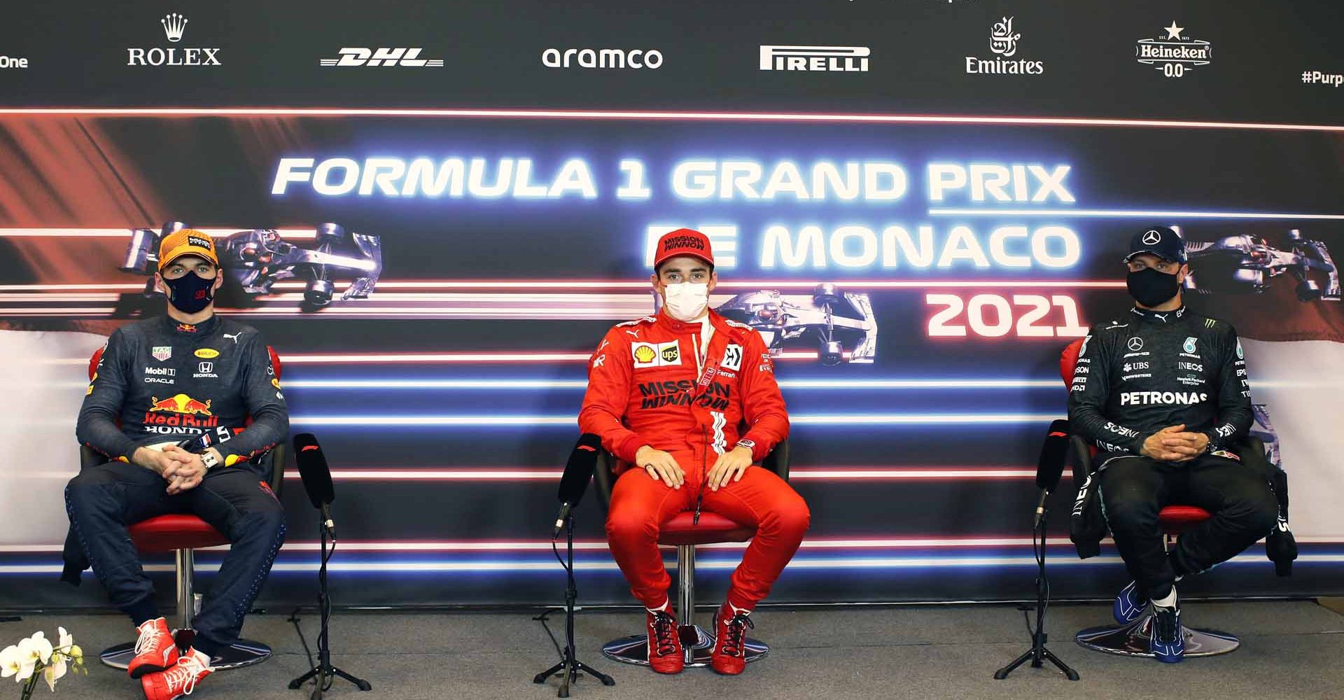 MONTE-CARLO, MONACO - MAY 22: Second placed qualifier Max Verstappen of Netherlands and Red Bull Racing, pole position qualifier Charles Leclerc of Monaco and Ferrari and third placed qualifier Valtteri Bottas of Finland and Mercedes GP talk during a Press Conference after qualifying prior to the F1 Grand Prix of Monaco at Circuit de Monaco on May 22, 2021 in Monte-Carlo, Monaco. (Photo by Zak Mauger - Pool/Getty Images)