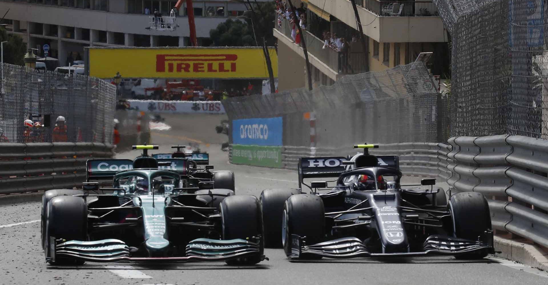 Formula One F1 - Monaco Grand Prix - Circuit de Monaco, Monte Carlo, Monaco - May 23, 2021 AlphaTauri's Pierre Gasly in action with Aston Martin's Sebastian Vettel during the race REUTERS/Gonzalo Fuentes