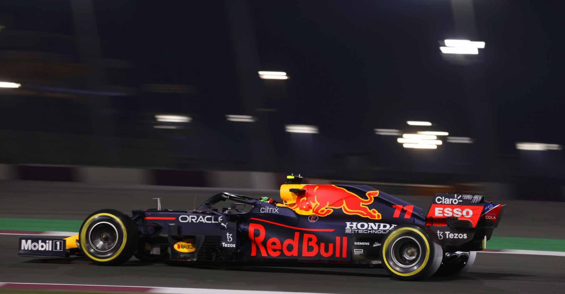 LOSAIL INTERNATIONAL CIRCUIT, QATAR - NOVEMBER 19: Sergio Perez, Red Bull Racing RB16B during the Qatar GP at Losail International Circuit on Friday November 19, 2021 in Losail, Qatar. (Photo by Glenn Dunbar / LAT Images)