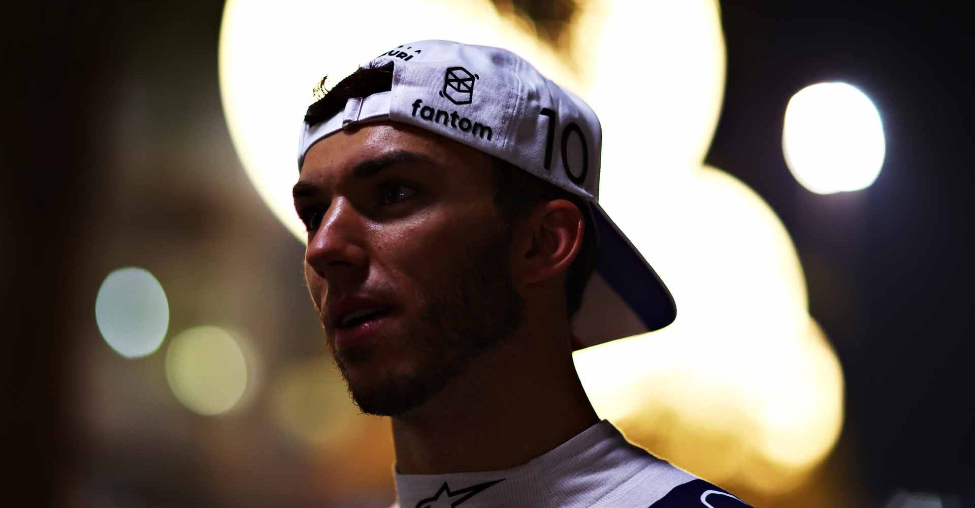 DOHA, QATAR - NOVEMBER 20: Pierre Gasly of France and Scuderia AlphaTauri talks to the media in the Paddock after qualifying ahead of the F1 Grand Prix of Qatar at Losail International Circuit on November 20, 2021 in Doha, Qatar. (Photo by Dan Istitene/Getty Images)