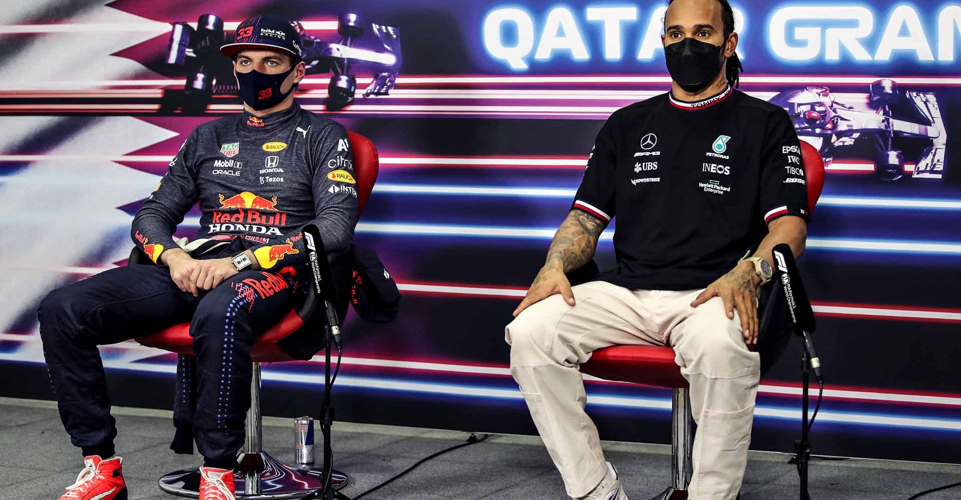 DOHA, QATAR - NOVEMBER 20: Pole position qualifier Lewis Hamilton of Great Britain and Mercedes GP and second placed qualifier Max Verstappen of Netherlands and Red Bull Racing talk in a press conference after qualifying ahead of the F1 Grand Prix of Qatar at Losail International Circuit on November 20, 2021 in Doha, Qatar. (Photo by Florent Gooden - Pool/Getty Images)