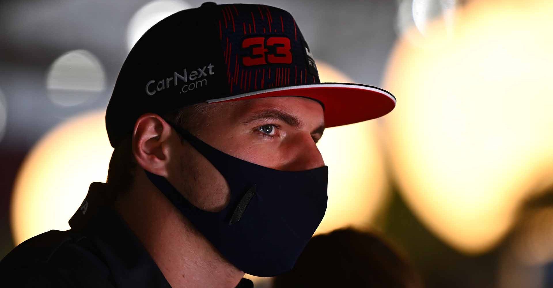 DOHA, QATAR - NOVEMBER 18: Max Verstappen of Netherlands and Red Bull Racing looks on in the Paddock during previews ahead of the F1 Grand Prix of Qatar at Losail International Circuit on November 18, 2021 in Doha, Qatar. (Photo by Clive Mason/Getty Images)