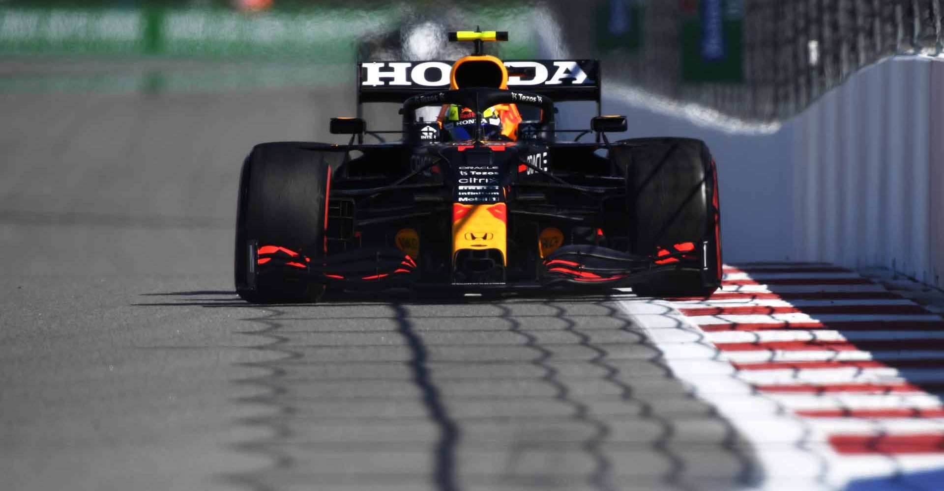 SOCHI, RUSSIA - SEPTEMBER 24: Sergio Perez of Mexico driving the (11) Red Bull Racing RB16B Honda during practice ahead of the F1 Grand Prix of Russia at Sochi Autodrom on September 24, 2021 in Sochi, Russia. (Photo by Rudy Carezzevoli/Getty Images)