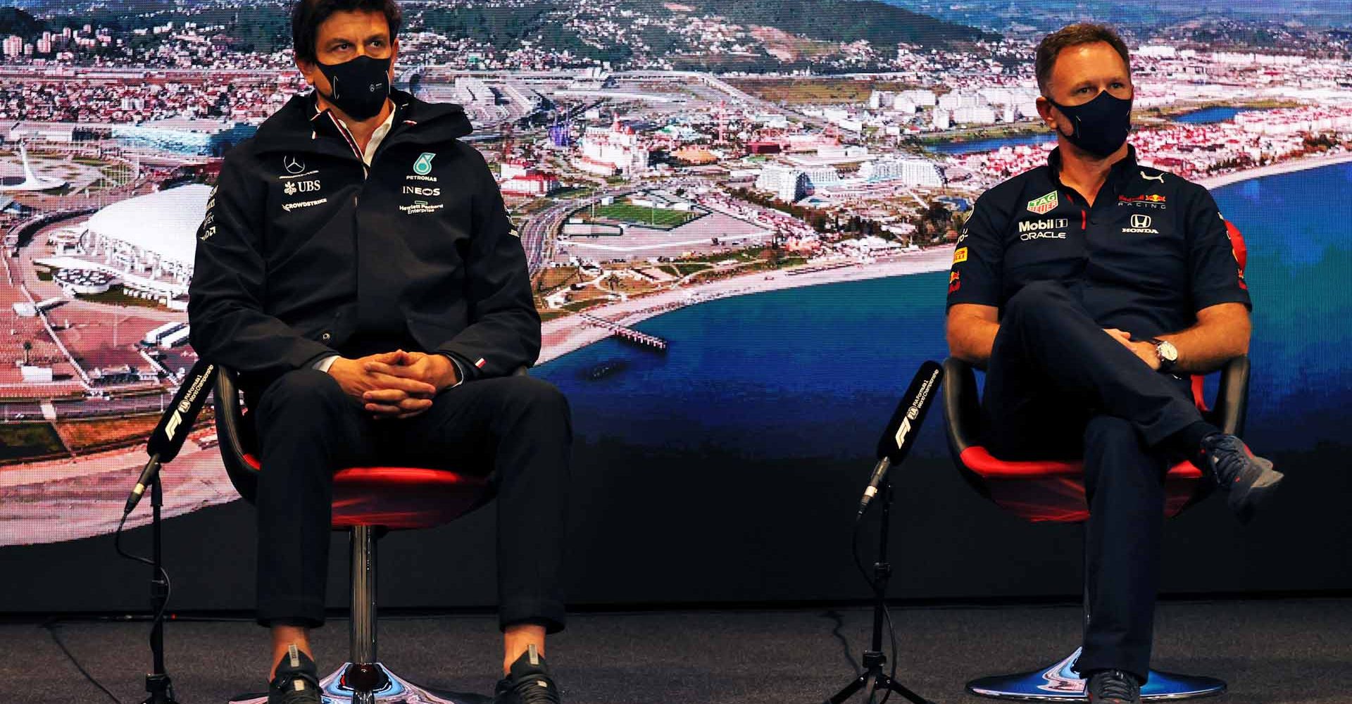 SOCHI, RUSSIA - SEPTEMBER 24: Mercedes GP Executive Director Toto Wolff and Red Bull Racing Team Principal Christian Horner talk in the Team Principals Press Conference during practice ahead of the F1 Grand Prix of Russia at Sochi Autodrom on September 24, 2021 in Sochi, Russia. (Photo by XPB - Pool/Getty Images)