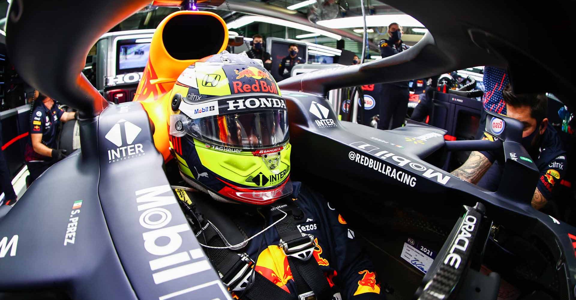 SOCHI, RUSSIA - SEPTEMBER 25: Sergio Perez of Mexico and Red Bull Racing prepares to drive in the garage during qualifying ahead of the F1 Grand Prix of Russia at Sochi Autodrom on September 25, 2021 in Sochi, Russia. (Photo by Mark Thompson/Getty Images)