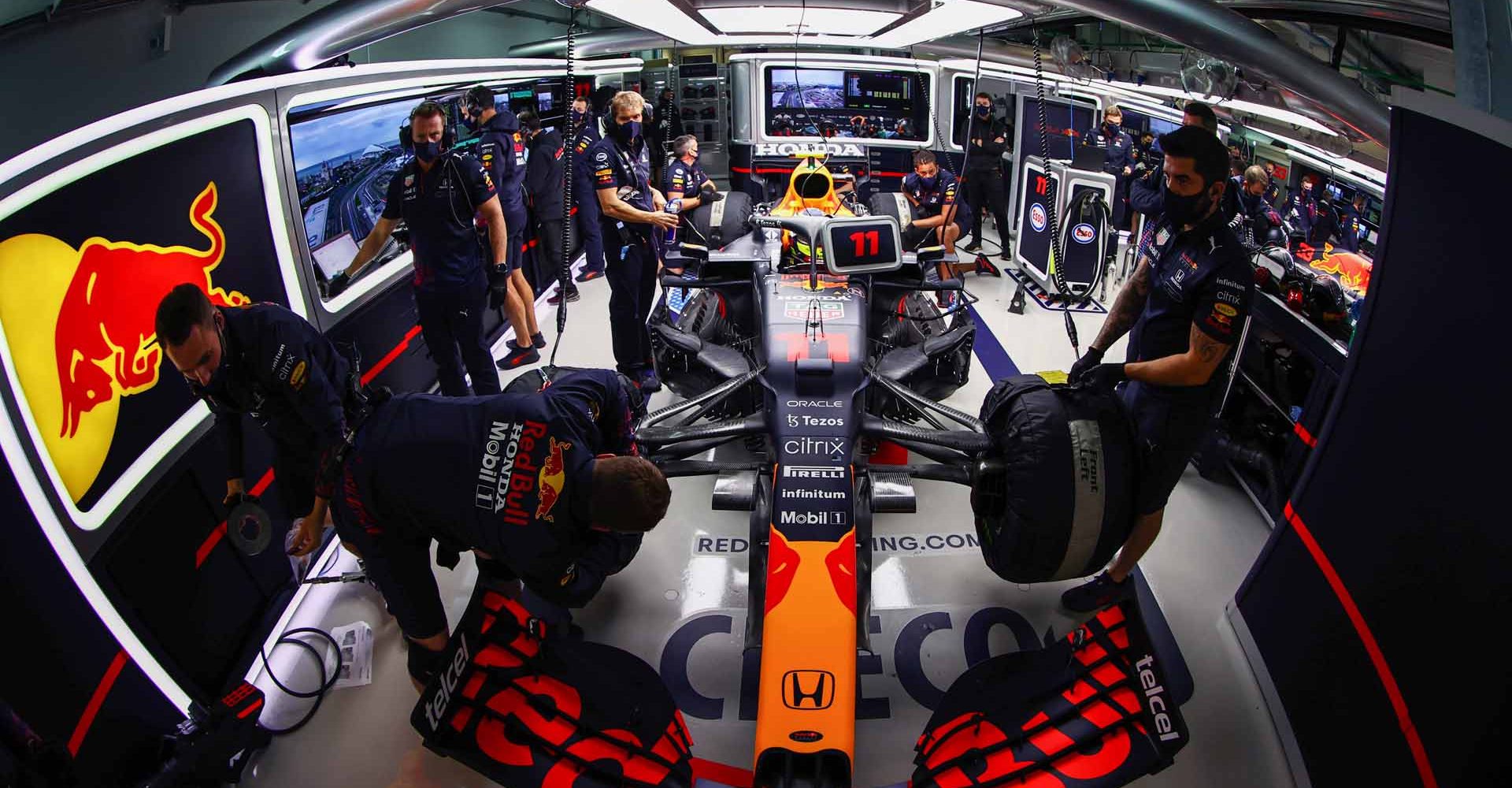 SOCHI, RUSSIA - SEPTEMBER 25: Sergio Perez of Mexico and Red Bull Racing prepares to drive in the garage during qualifying ahead of the F1 Grand Prix of Russia at Sochi Autodrom on September 25, 2021 in Sochi, Russia. (Photo by Mark Thompson/Getty Images)