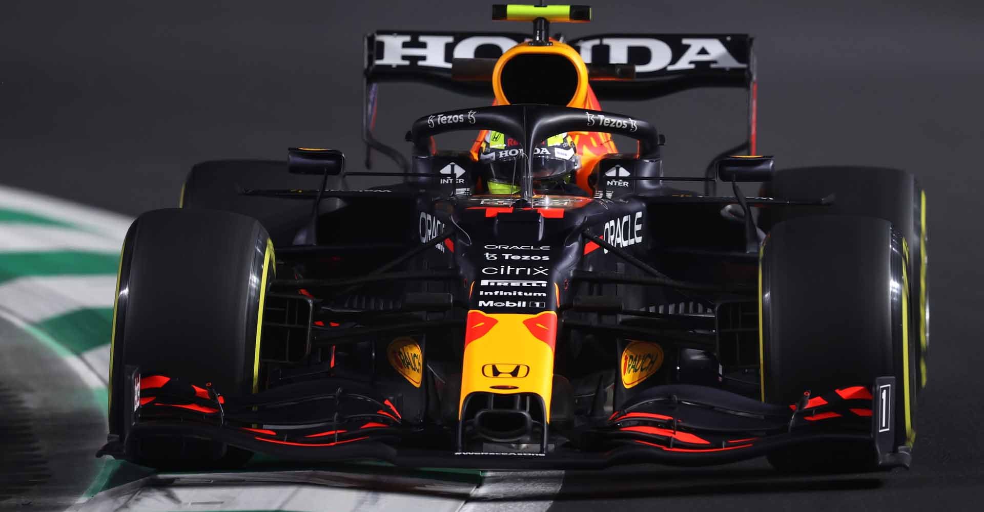 JEDDAH, SAUDI ARABIA - DECEMBER 03:Sergio Perez of Mexico driving the (11) Red Bull Racing RB16B Honda  during practice ahead of the F1 Grand Prix of Saudi Arabia at Jeddah Corniche Circuit on December 03, 2021 in Jeddah, Saudi Arabia. (Photo by Lars Baron/Getty Images)