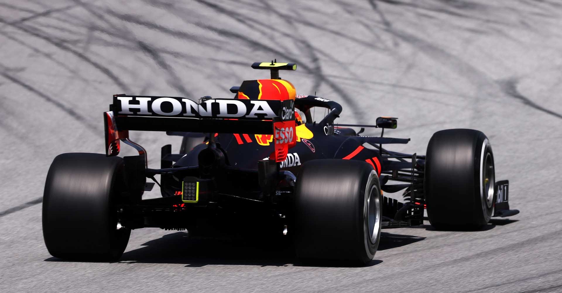 BARCELONA, SPAIN - MAY 07: Sergio Perez of Mexico driving the (11) Red Bull Racing RB16B Honda on track during practice for the F1 Grand Prix of Spain at Circuit de Barcelona-Catalunya on May 07, 2021 in Barcelona, Spain. (Photo by Lars Baron/Getty Images)