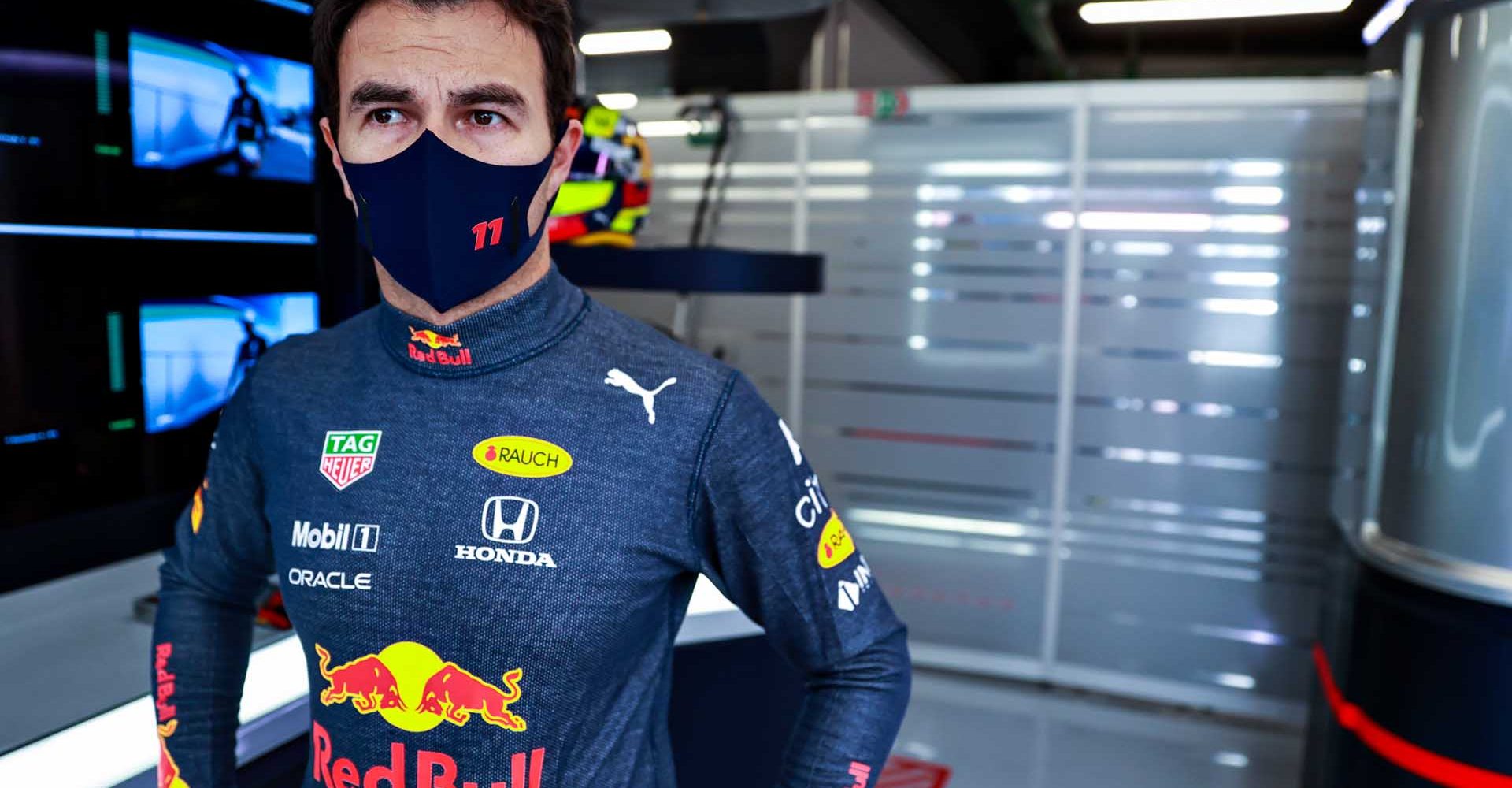 BARCELONA, SPAIN - MAY 07: Sergio Perez of Mexico and Red Bull Racing prepares to drive in the garage during practice for the F1 Grand Prix of Spain at Circuit de Barcelona-Catalunya on May 07, 2021 in Barcelona, Spain. (Photo by Mark Thompson/Getty Images,)