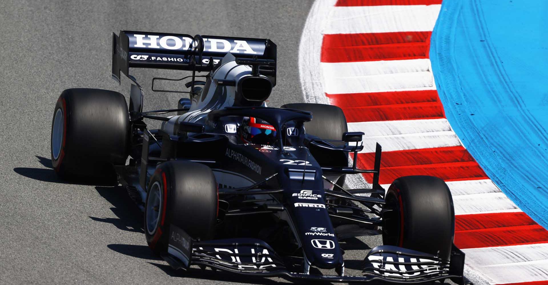 BARCELONA, SPAIN - MAY 08: Yuki Tsunoda of Japan driving the (22) Scuderia AlphaTauri AT02 Honda on track during qualifying for the F1 Grand Prix of Spain at Circuit de Barcelona-Catalunya on May 08, 2021 in Barcelona, Spain. (Photo by Bryn Lennon/Getty Images)