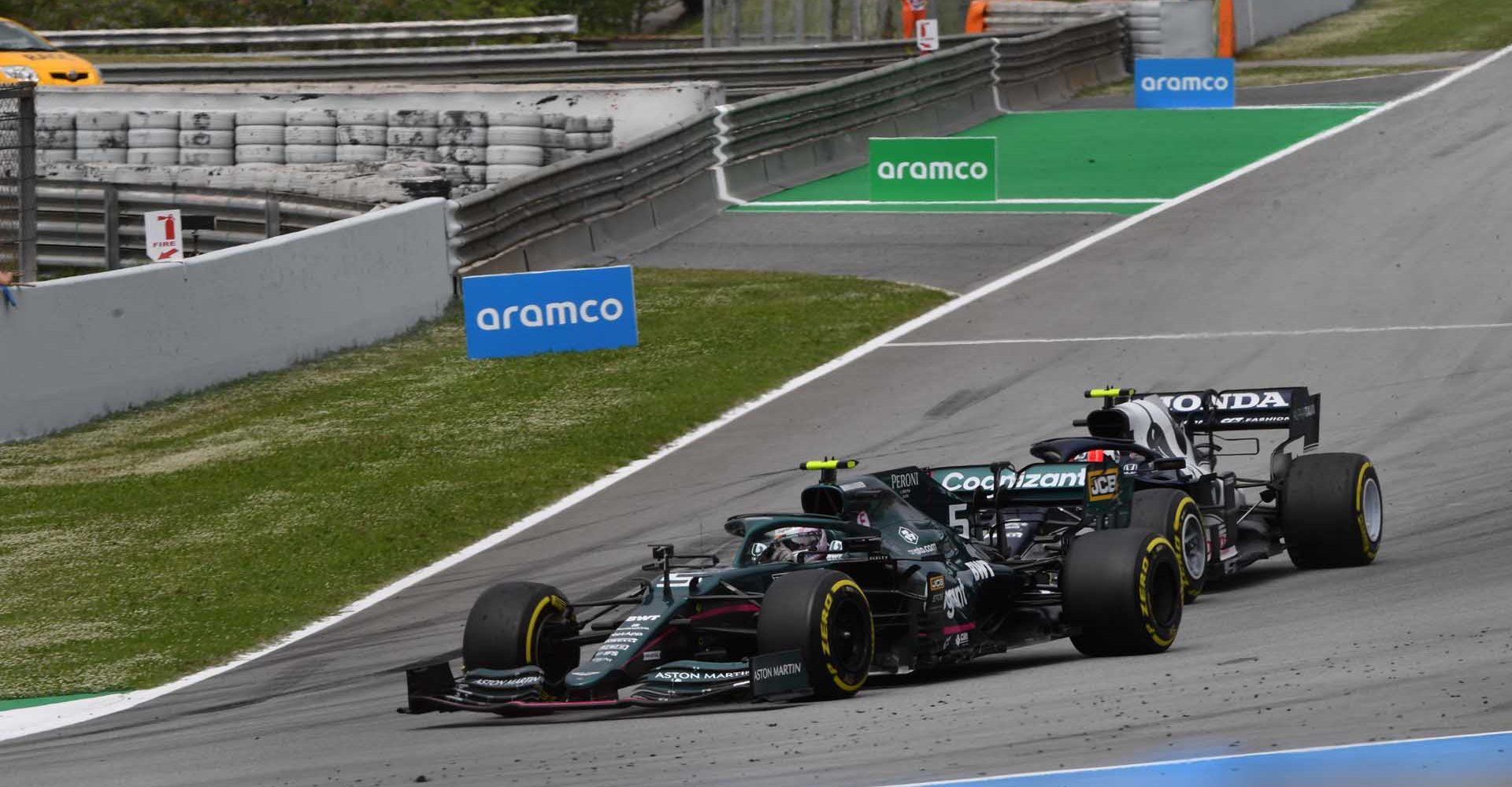 Sebastian Vettel, Aston Martin AMR21, leads Pierre Gasly, AlphaTauri AT02