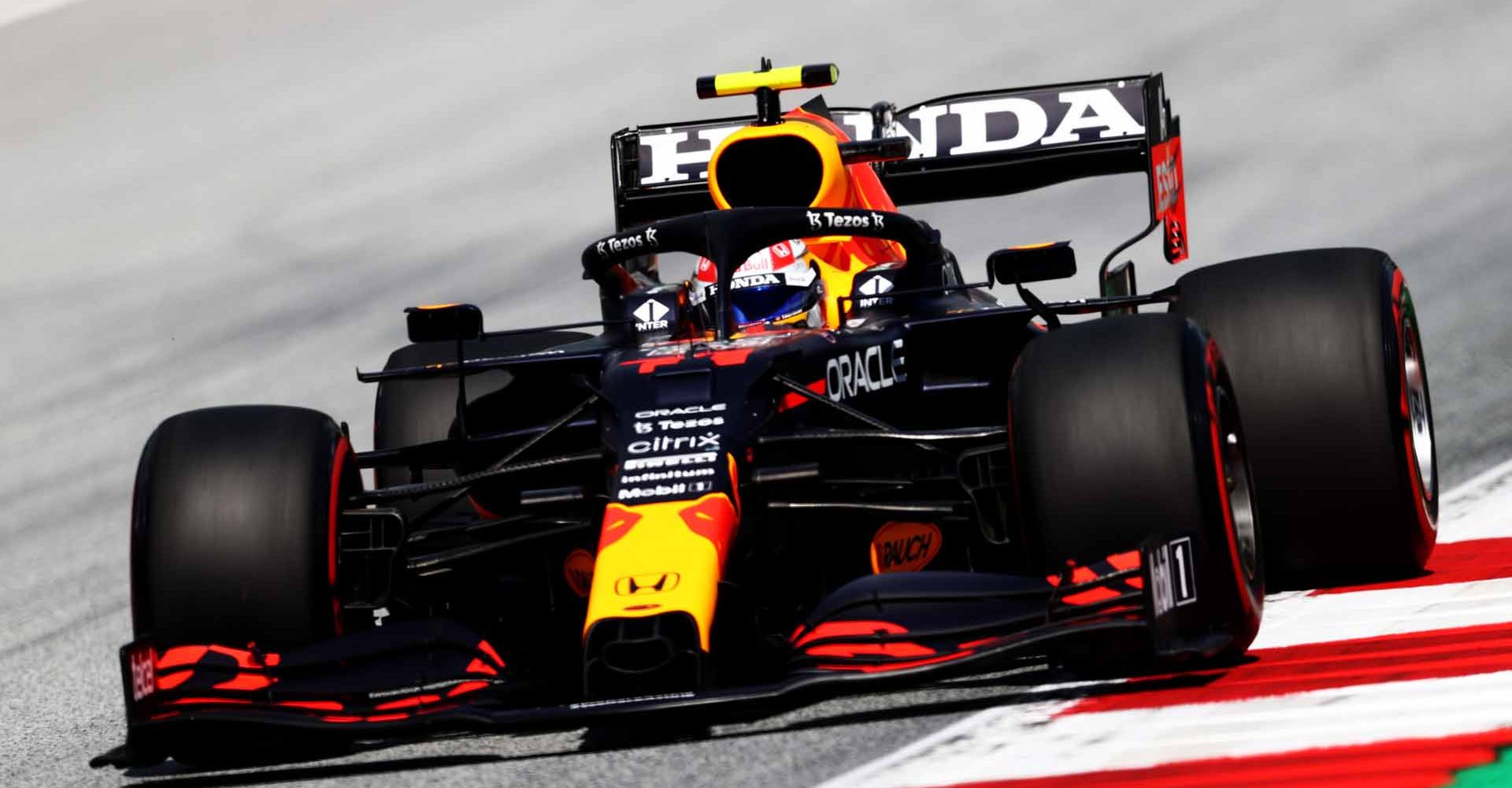 SPIELBERG, AUSTRIA - JUNE 26: Sergio Perez of Mexico driving the (11) Red Bull Racing RB16B Honda on track during qualifying ahead of the F1 Grand Prix of Styria at Red Bull Ring on June 26, 2021 in Spielberg, Austria. (Photo by Clive Rose/Getty Images)