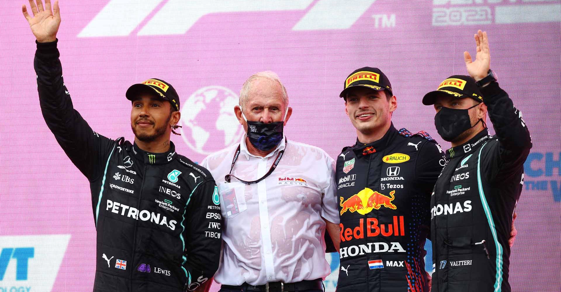 SPIELBERG, AUSTRIA - JUNE 27: Race winner Max Verstappen of Netherlands and Red Bull Racing, second placed Lewis Hamilton of Great Britain and Mercedes GP, third placed Valtteri Bottas of Finland and Mercedes GP and Red Bull Racing Team Consultant Dr Helmut Marko celebrate on the podium during the F1 Grand Prix of Styria at Red Bull Ring on June 27, 2021 in Spielberg, Austria. (Photo by Bryn Lennon/Getty Images)