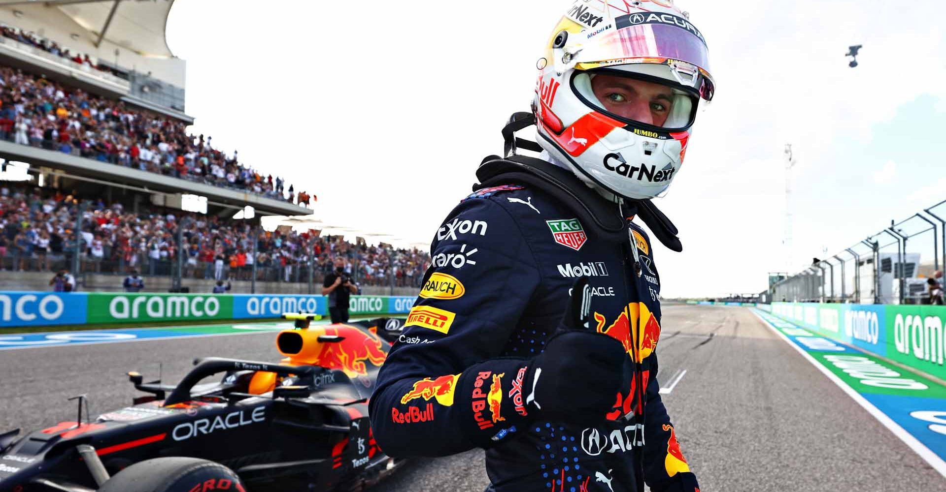 AUSTIN, TEXAS - OCTOBER 23: Pole position qualifier Max Verstappen of Netherlands and Red Bull Racing celebrates in parc ferme during qualifying ahead of the F1 Grand Prix of USA at Circuit of The Americas on October 23, 2021 in Austin, Texas. (Photo by Mark Thompson/Getty Images)