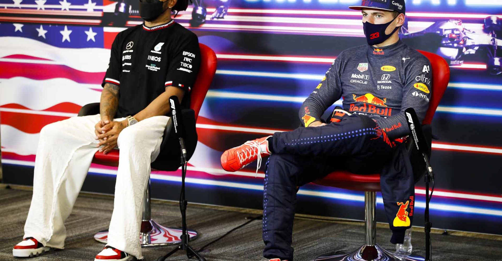 AUSTIN, TEXAS - OCTOBER 24: Race winner Max Verstappen of Netherlands and Red Bull Racing and second placed Lewis Hamilton of Great Britain and Mercedes GP talk in the press conference after the F1 Grand Prix of USA at Circuit of The Americas on October 24, 2021 in Austin, Texas. (Photo by Zak Mauger - Pool/Getty Images)