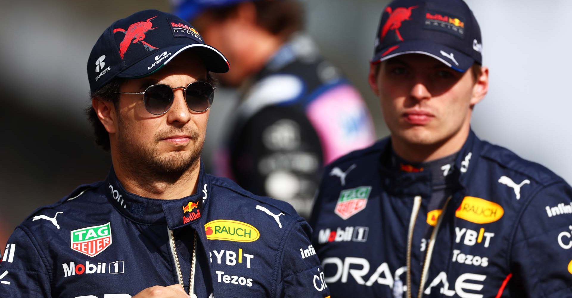 ABU DHABI, UNITED ARAB EMIRATES - NOVEMBER 20: Sergio Perez of Mexico and Oracle Red Bull Racing and Max Verstappen of the Netherlands and Oracle Red Bull Racing take part in the F1 2022 End of Year photo prior to the F1 Grand Prix of Abu Dhabi at Yas Marina Circuit on November 20, 2022 in Abu Dhabi, United Arab Emirates. (Photo by Mark Thompson/Getty Images)