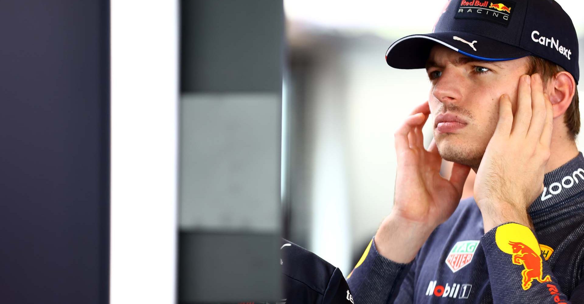 ABU DHABI, UNITED ARAB EMIRATES - NOVEMBER 22: Max Verstappen of the Netherlands and Oracle Red Bull Racing looks on in the garage during Formula 1 testing at Yas Marina Circuit on November 22, 2022 in Abu Dhabi, United Arab Emirates. (Photo by Mark Thompson/Getty Images)