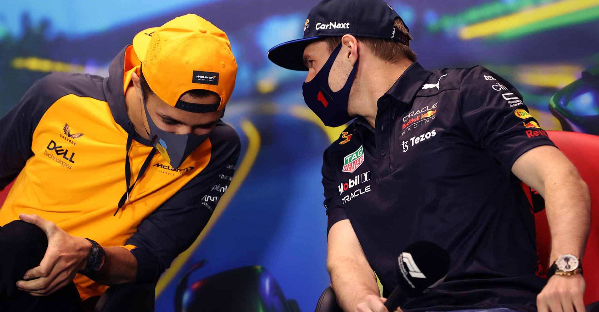 MELBOURNE, AUSTRALIA - APRIL 08: Max Verstappen of the Netherlands and Oracle Red Bull Racing talks with Lando Norris of Great Britain and McLaren in the Drivers Press Conference prior to practice ahead of the F1 Grand Prix of Australia at Melbourne Grand Prix Circuit on April 08, 2022 in Melbourne, Australia. (Photo by Robert Cianflone/Getty Images)