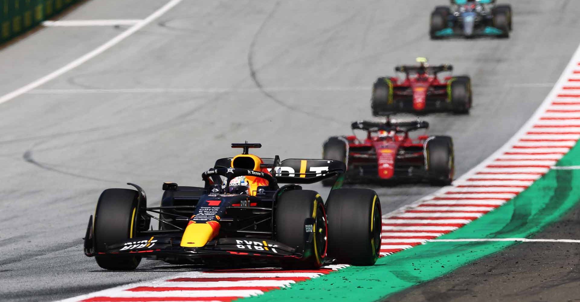 SPIELBERG, AUSTRIA - JULY 09: Max Verstappen of the Netherlands driving the (1) Oracle Red Bull Racing RB18 leads Charles Leclerc of Monaco driving the (16) Ferrari F1-75 during the F1 Grand Prix of Austria Sprint at Red Bull Ring on July 09, 2022 in Spielberg, Austria. (Photo by Peter Fox/Getty Images)