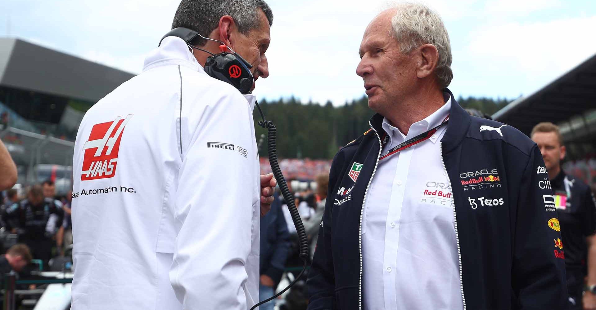 SPIELBERG, AUSTRIA - JULY 10: Red Bull Racing Team Consultant Dr Helmut Marko and Haas F1 Team Principal Guenther Steiner talk on the grid during the F1 Grand Prix of Austria at Red Bull Ring on July 10, 2022 in Spielberg, Austria. (Photo by Bryn Lennon/Getty Images)