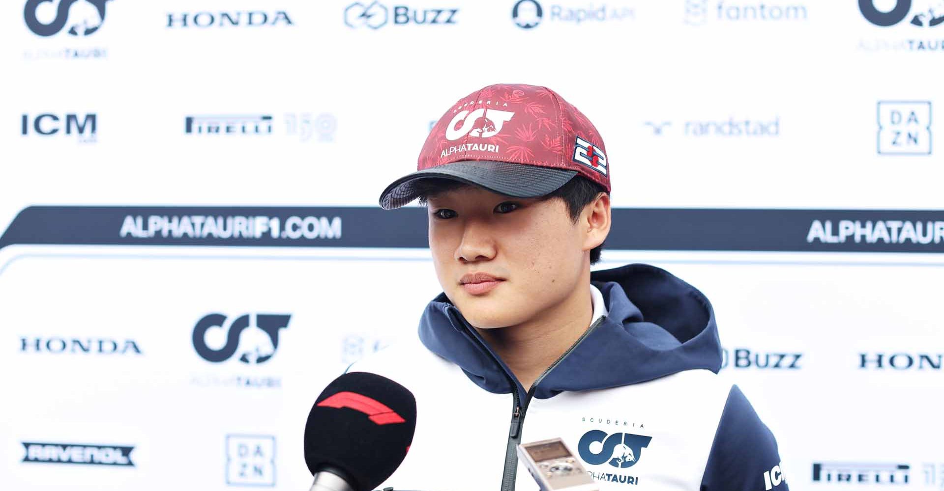 SPIELBERG, AUSTRIA - JULY 07: Yuki Tsunoda of Japan and Scuderia AlphaTauri talks to the media in the Paddock during previews ahead of the F1 Grand Prix of Austria at Red Bull Ring on July 07, 2022 in Spielberg, Austria. (Photo by Peter Fox/Getty Images)