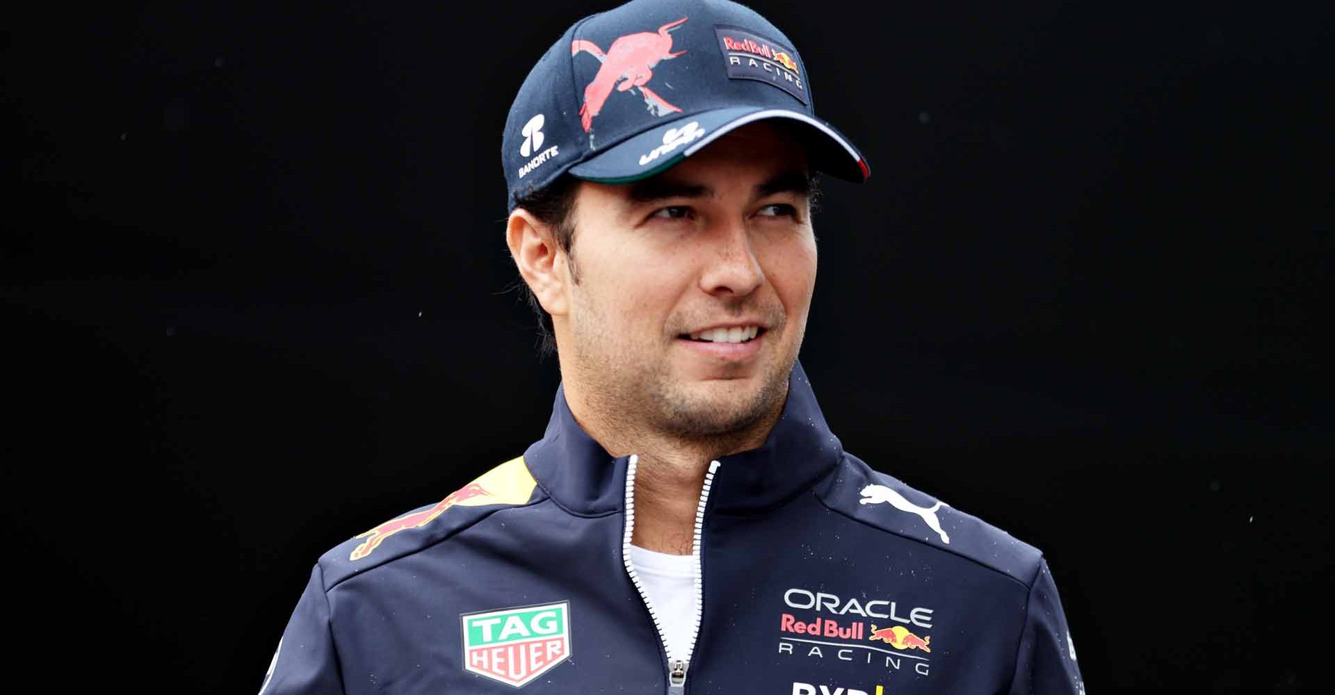 SPIELBERG, AUSTRIA - JULY 07: Sergio Perez of Mexico and Oracle Red Bull Racing walks in the Paddock during previews ahead of the F1 Grand Prix of Austria at Red Bull Ring on July 07, 2022 in Spielberg, Austria. (Photo by Bryn Lennon/Getty Images)