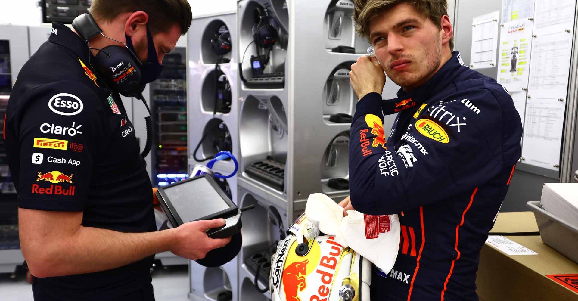 BAHRAIN, BAHRAIN - MARCH 18: Max Verstappen of the Netherlands and Oracle Red Bull Racing takes off his helmet during practice ahead of the F1 Grand Prix of Bahrain at Bahrain International Circuit on March 18, 2022 in Bahrain, Bahrain. (Photo by Mark Thompson/Getty Images)