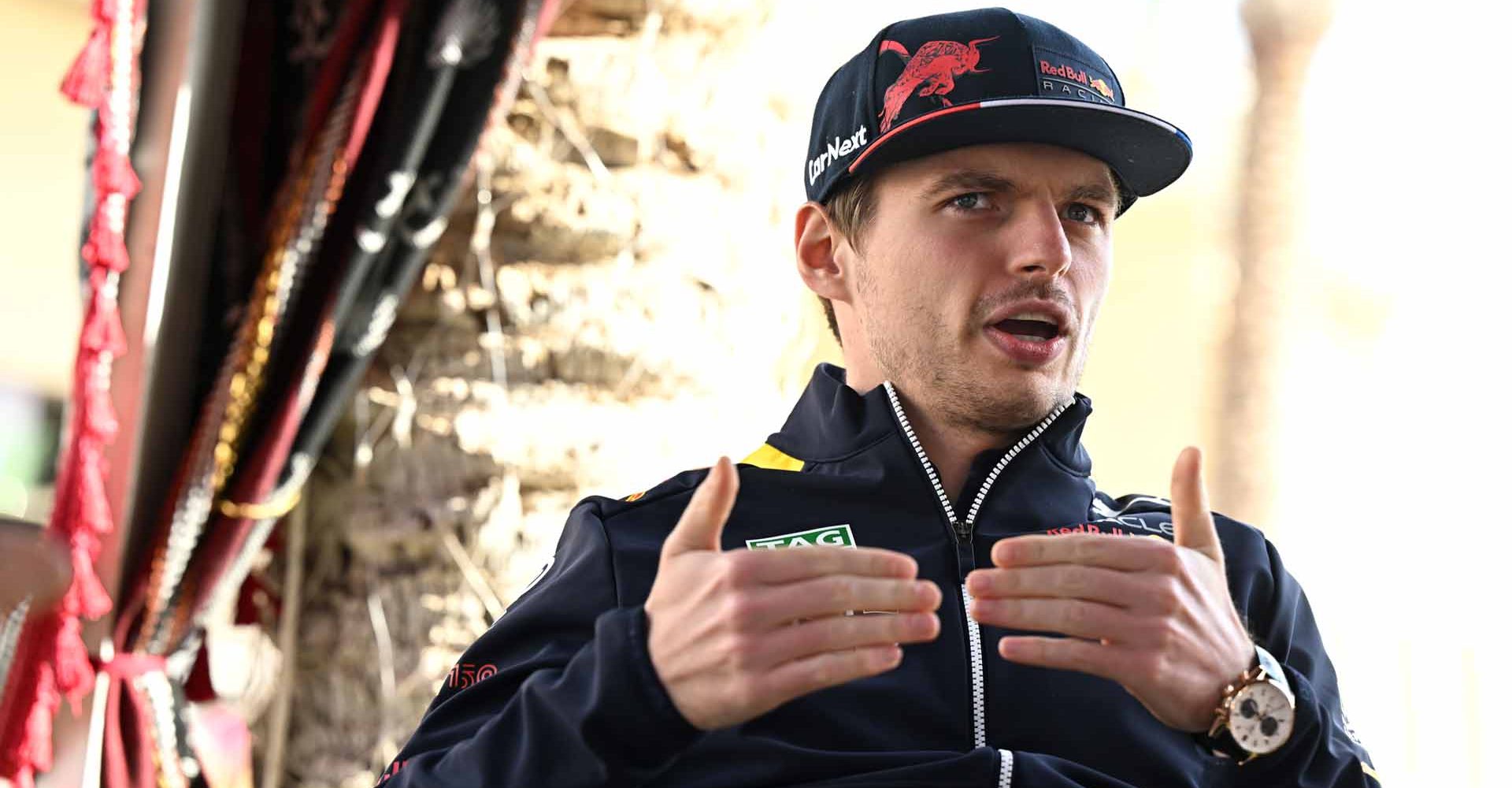 BAHRAIN, BAHRAIN - MARCH 17: Max Verstappen of the Netherlands and Oracle Red Bull Racing looks on in the Paddock during previews ahead of the F1 Grand Prix of Bahrain at Bahrain International Circuit on March 17, 2022 in Bahrain, Bahrain. (Photo by Clive Mason/Getty Images)