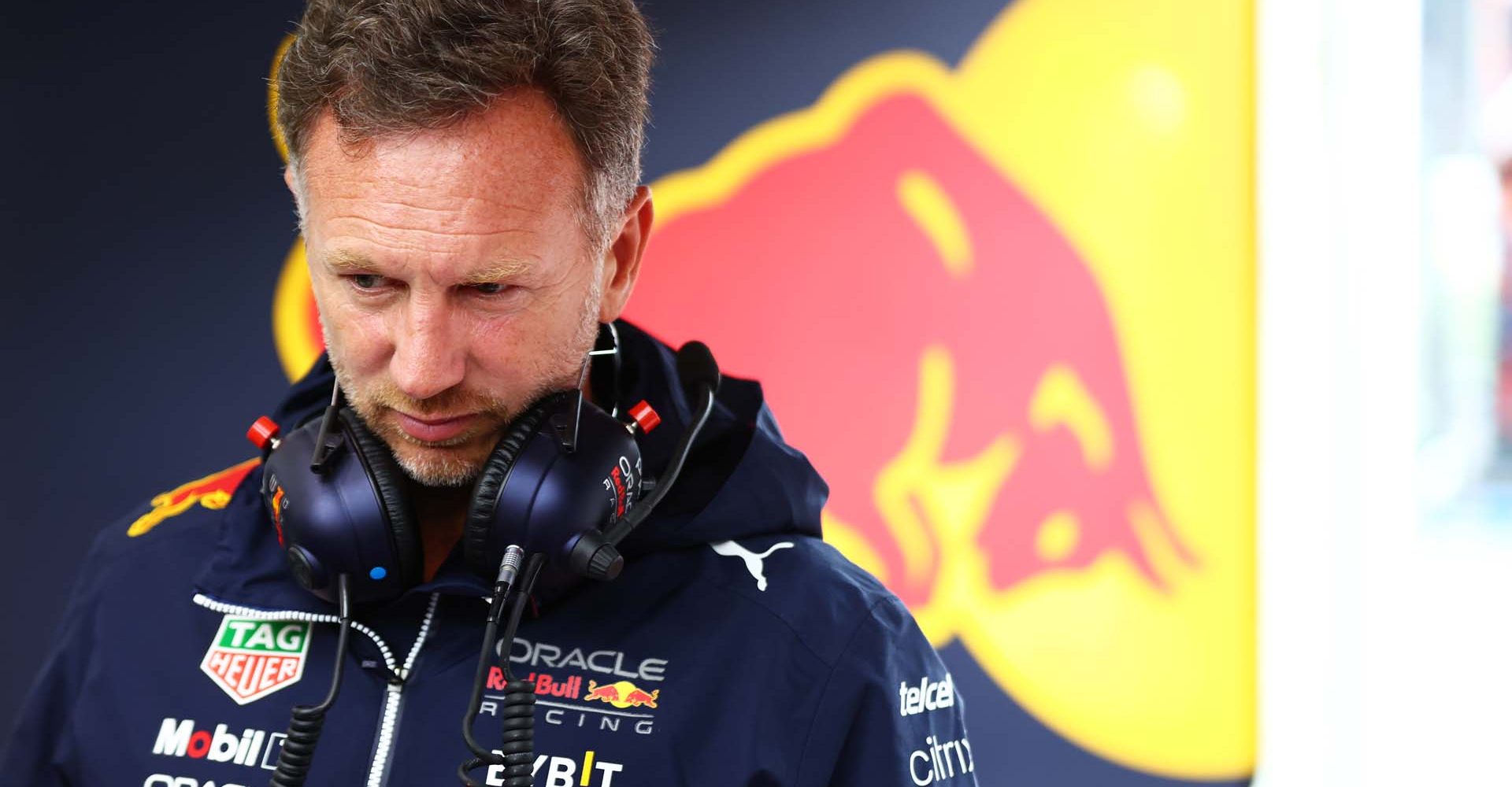 SPA, BELGIUM - AUGUST 26: Red Bull Racing Team Principal Christian Horner looks on in the garage during practice ahead of the F1 Grand Prix of Belgium at Circuit de Spa-Francorchamps on August 26, 2022 in Spa, Belgium. (Photo by Mark Thompson/Getty Images)