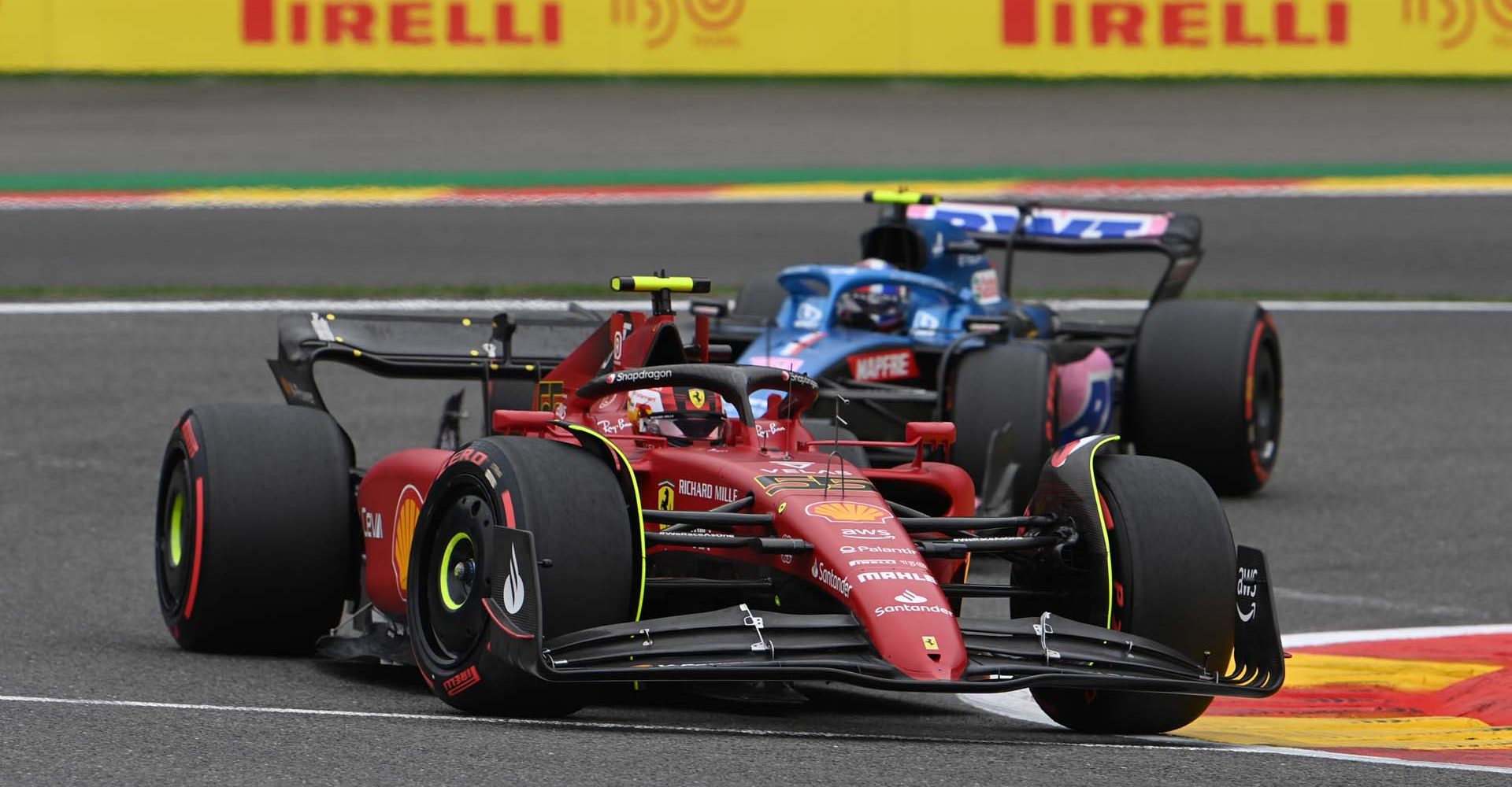 CIRCUIT DE SPA FRANCORCHAMPS, BELGIUM - AUGUST 27: Carlos Sainz, Ferrari F1-75, leads Esteban Ocon, Alpine A522 during the Belgian GP at Circuit de Spa Francorchamps on Saturday August 27, 2022 in Spa, Belgium. (Photo by Mark Sutton / LAT Images)