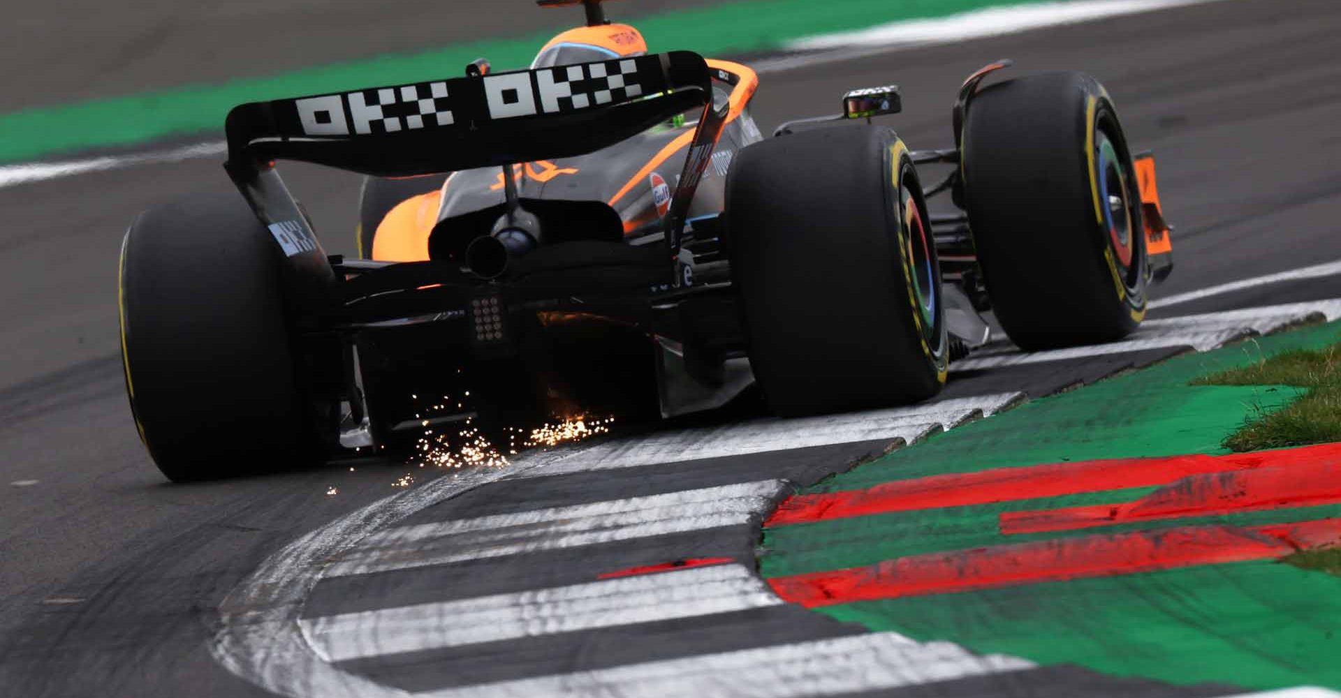 Daniel Ricciardo, McLaren MCL36, kicks up sparks