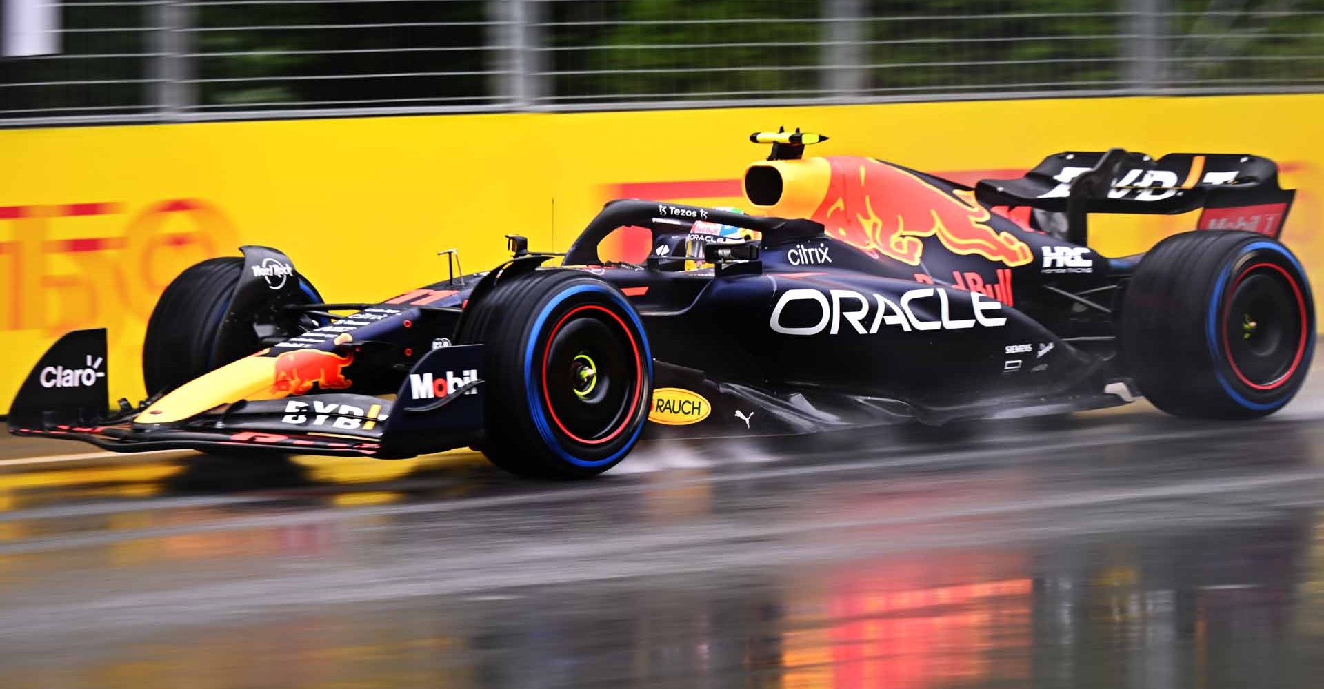 MONTREAL, QUEBEC - JUNE 18: Sergio Perez of Mexico driving the (11) Oracle Red Bull Racing RB18 in the wet during final practice ahead of the F1 Grand Prix of Canada at Circuit Gilles Villeneuve on June 18, 2022 in Montreal, Quebec. (Photo by Clive Mason/Getty Images)