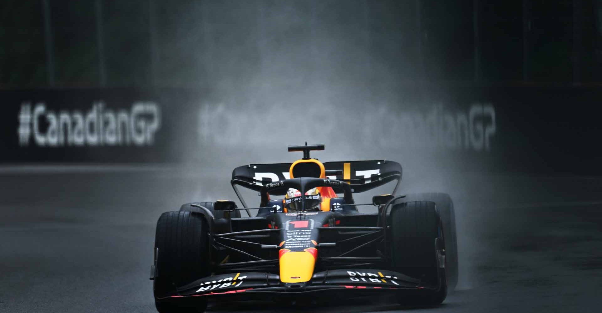 MONTREAL, QUEBEC - JUNE 18: Max Verstappen of the Netherlands driving the (1) Oracle Red Bull Racing RB18 in the wet during final practice ahead of the F1 Grand Prix of Canada at Circuit Gilles Villeneuve on June 18, 2022 in Montreal, Quebec. (Photo by Clive Mason/Getty Images)