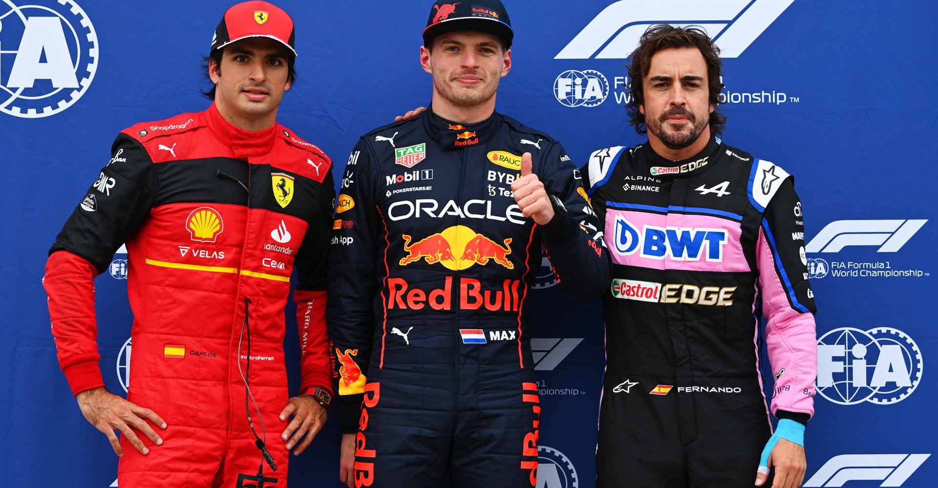 MONTREAL, QUEBEC - JUNE 18: Pole position qualifier Max Verstappen of the Netherlands and Oracle Red Bull Racing (C), Second placed qualifier Fernando Alonso of Spain and Alpine F1 (R) and Third placed qualifier Carlos Sainz of Spain and Ferrari (L) pose for a photo in parc ferme during qualifying ahead of the F1 Grand Prix of Canada at Circuit Gilles Villeneuve on June 18, 2022 in Montreal, Quebec. (Photo by Dan Mullan/Getty Images)