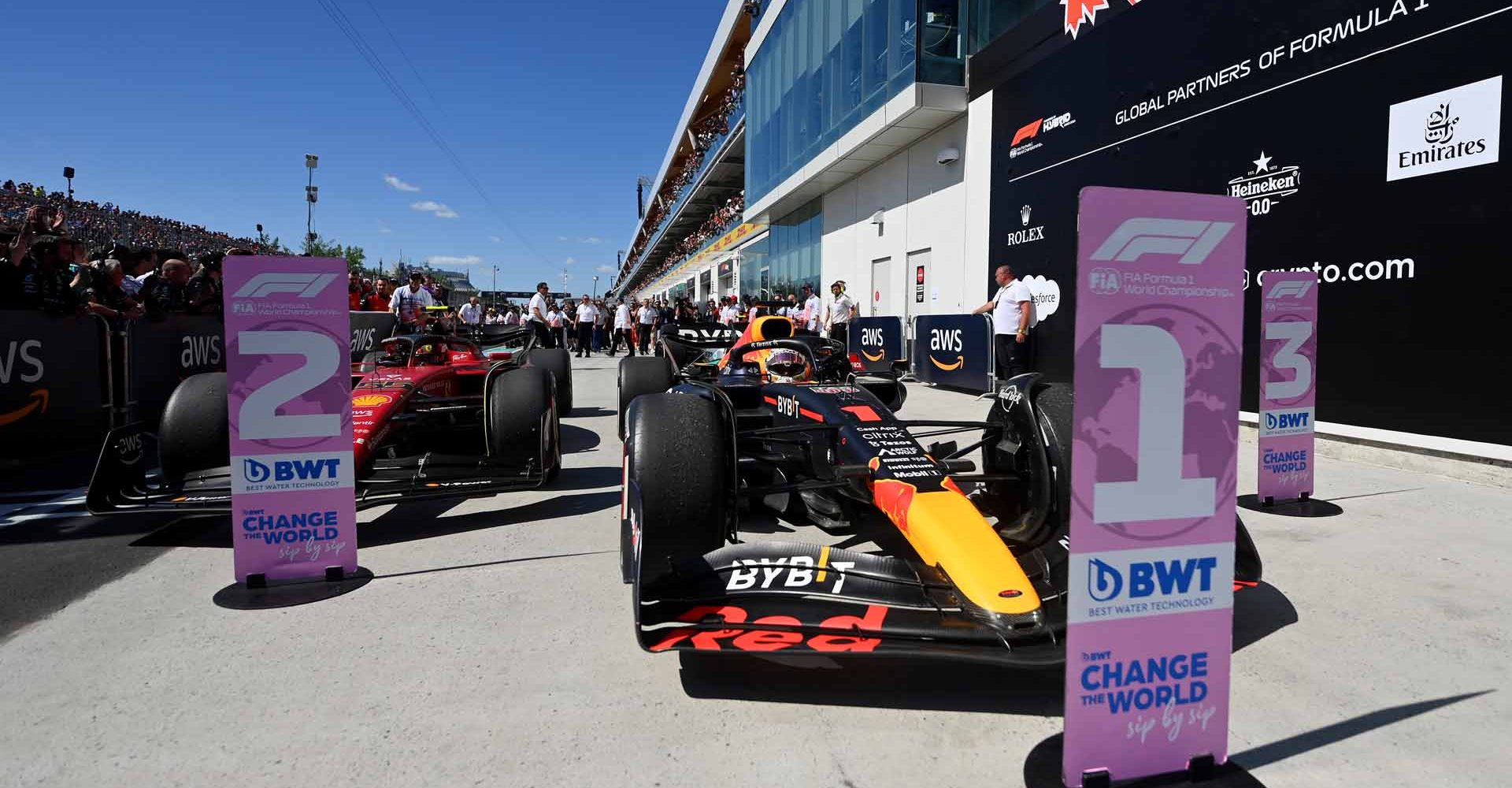 MONTREAL, QUEBEC - JUNE 19: Race winner Max Verstappen of the Netherlands and Oracle Red Bull Racing and Second placed Carlos Sainz of Spain and Ferrari stop in parc ferme during the F1 Grand Prix of Canada at Circuit Gilles Villeneuve on June 19, 2022 in Montreal, Quebec. (Photo by Dan Mullan/Getty Images)