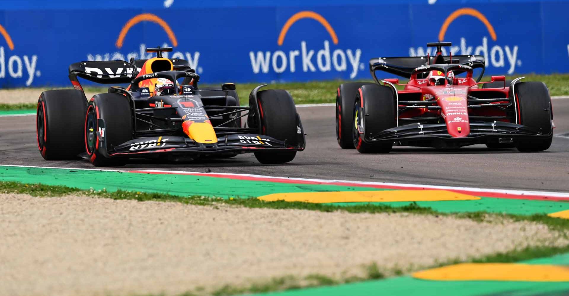 IMOLA, ITALY - APRIL 23: Max Verstappen of the Netherlands driving the (1) Oracle Red Bull Racing RB18 overtakes Charles Leclerc of Monaco driving (16) the Ferrari F1-75 for the lead during Sprint ahead of the F1 Grand Prix of Emilia Romagna at Autodromo Enzo e Dino Ferrari on April 23, 2022 in Imola, Italy. (Photo by Dan Mullan/Getty Images)