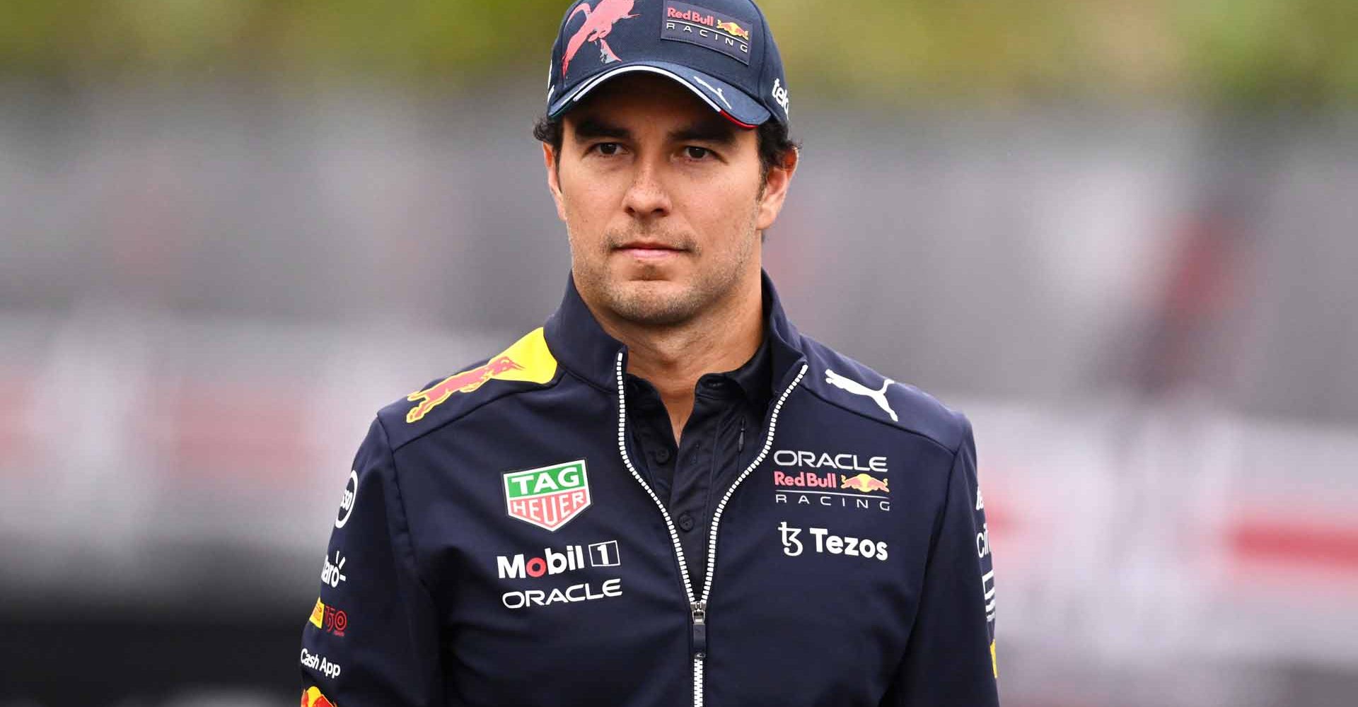 IMOLA, ITALY - APRIL 21: Sergio Perez of Mexico and Oracle Red Bull Racing walks in the Paddock during previews ahead of the F1 Grand Prix of Emilia Romagna at Autodromo Enzo e Dino Ferrari on April 21, 2022 in Imola, Italy. (Photo by Clive Mason/Getty Images)